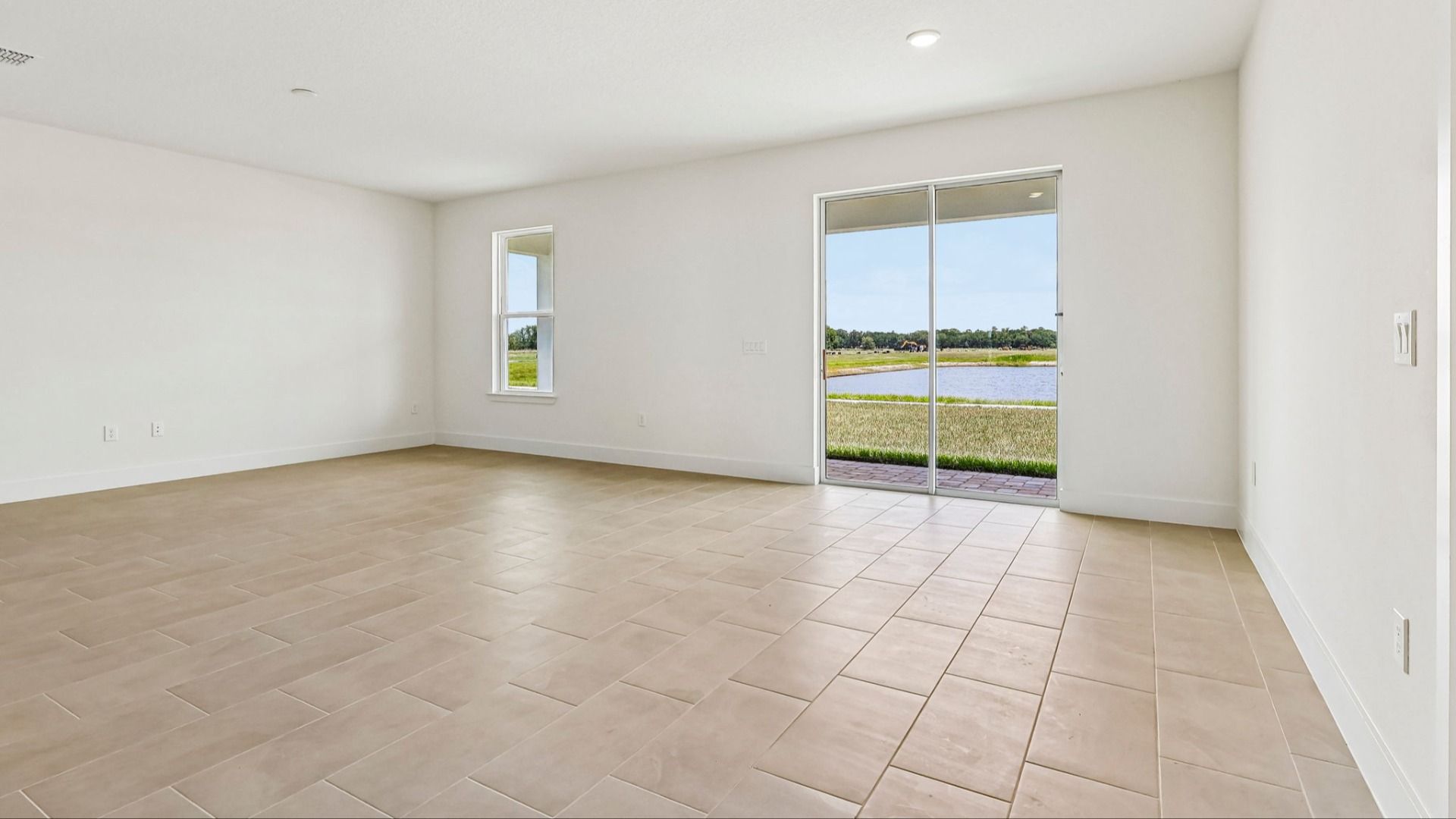 Longleaf Floor Plan Open Concept Living, Living Area and Dining Area by DRB Homes in Trailside New Homes in Mount Dora Fl