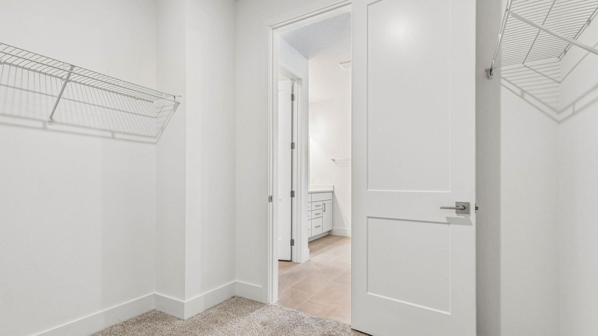 Longleaf Primary Suite Bath Walk-in Closet by DRB Homes in Trailside New Homes in Mount Dora FL