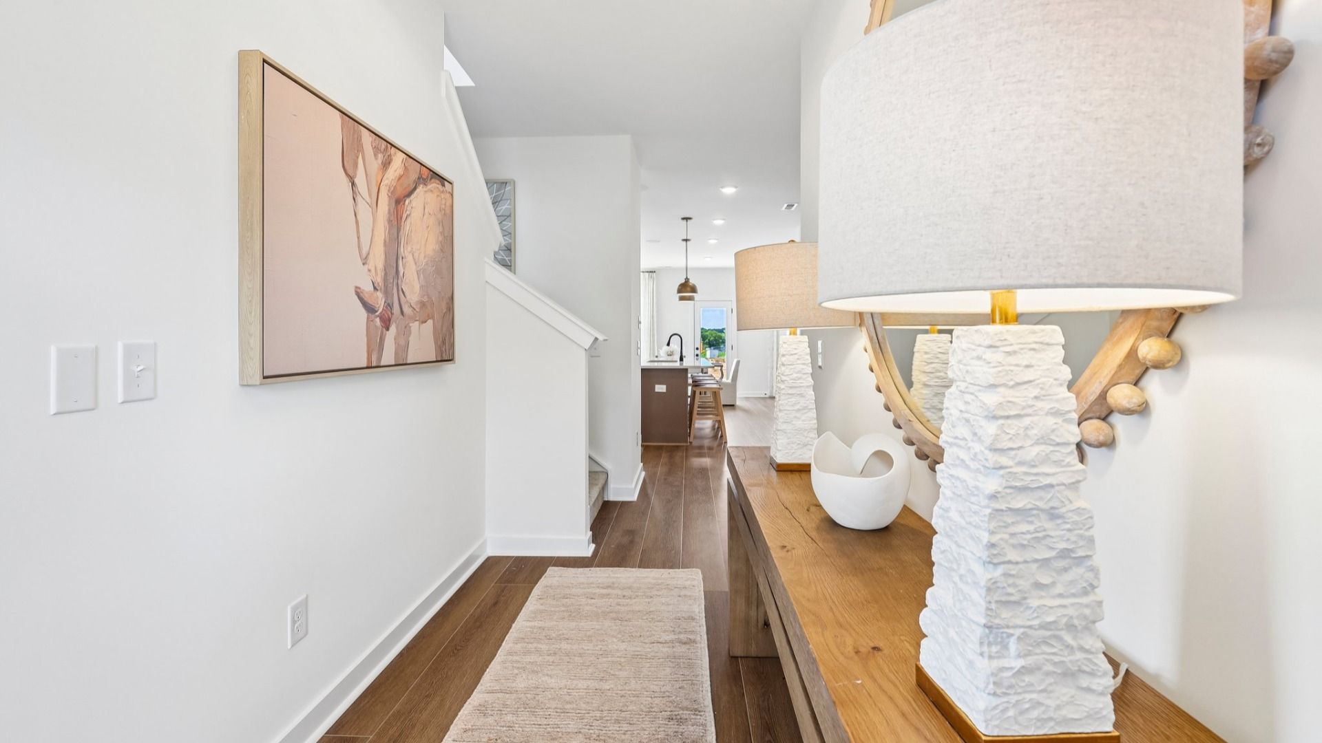 Front entryway into main living areas with access to staircase