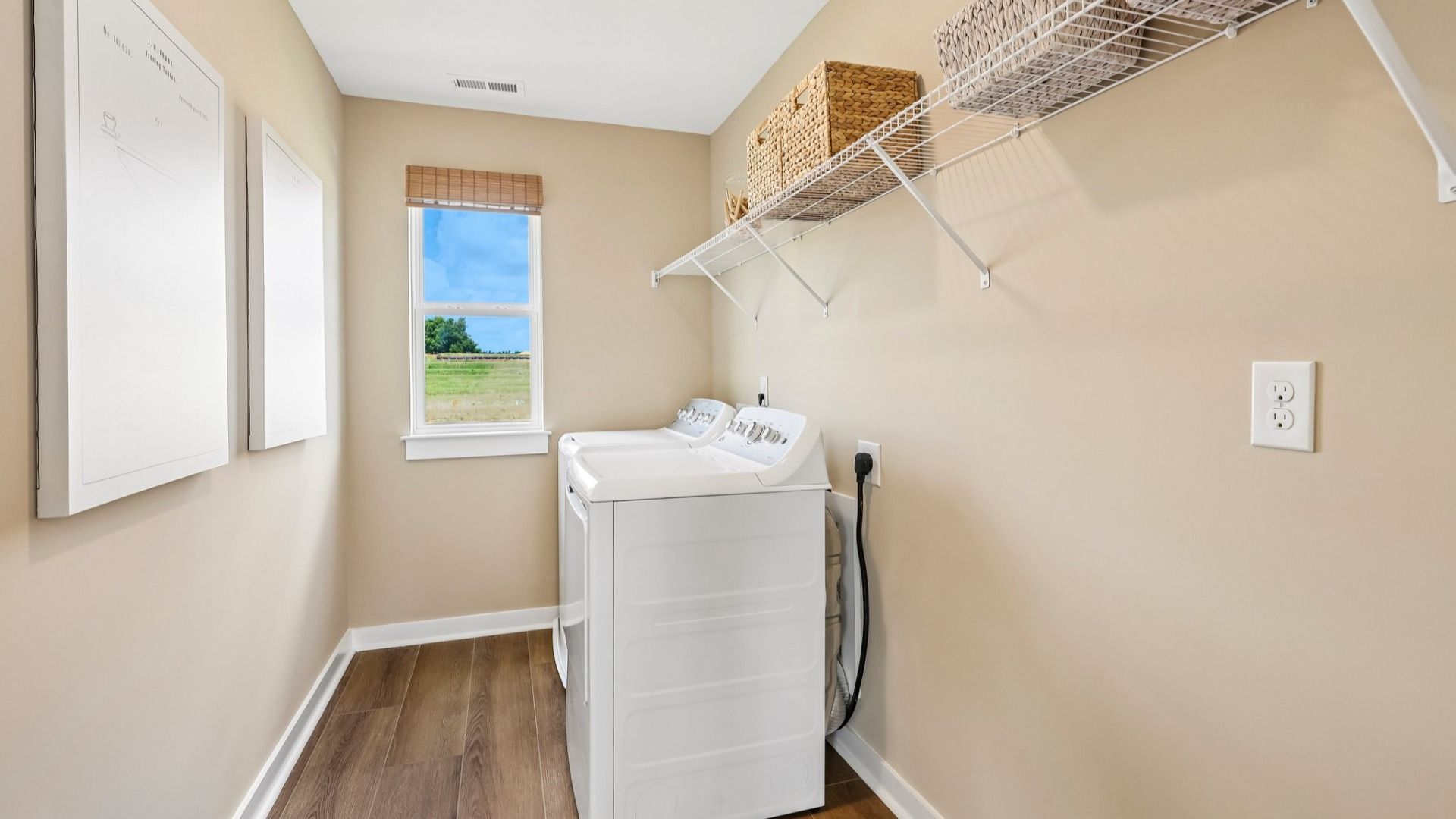 Dedicated laundry space with window and ventilated shelf