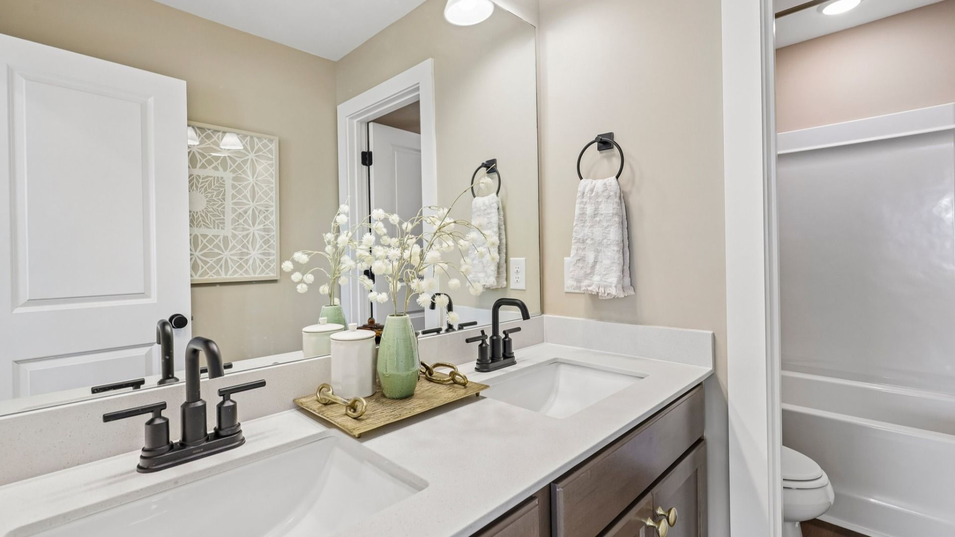Secondary bathroom with dual vanity