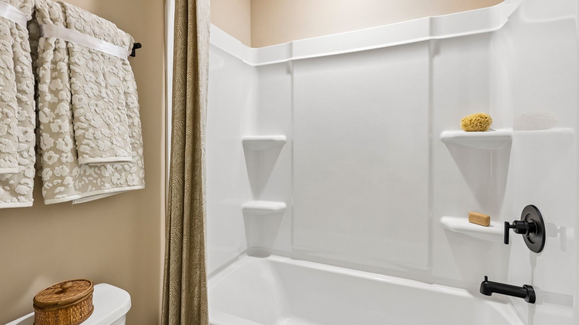 Secondary bathroom with shower and toilet