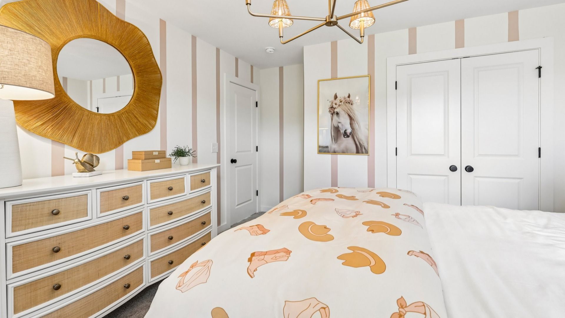 Secondary bedroom with carpet, closet, and window
