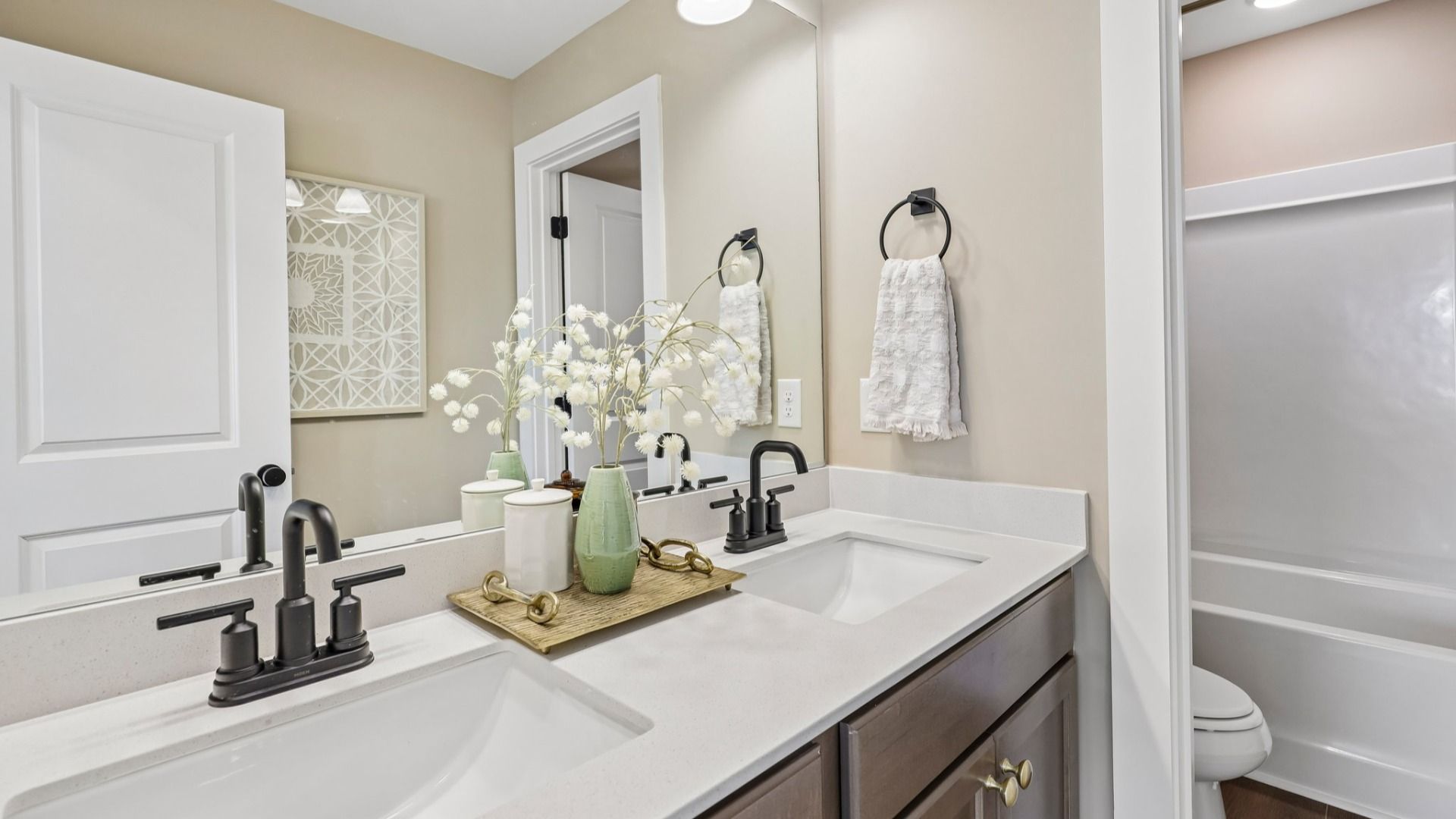Spacious secondary bathroom with dual vanity
