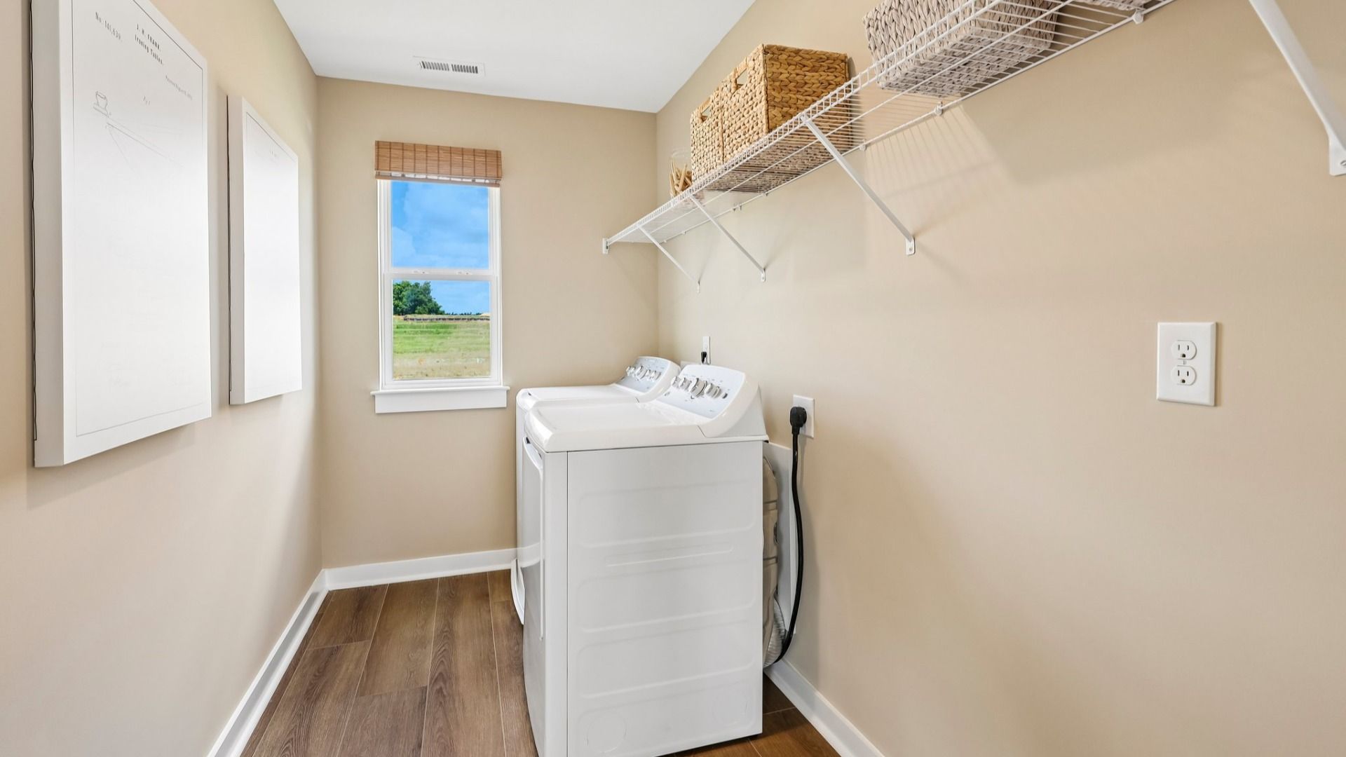 Dedicated laundry space with window and ventilated shelf
