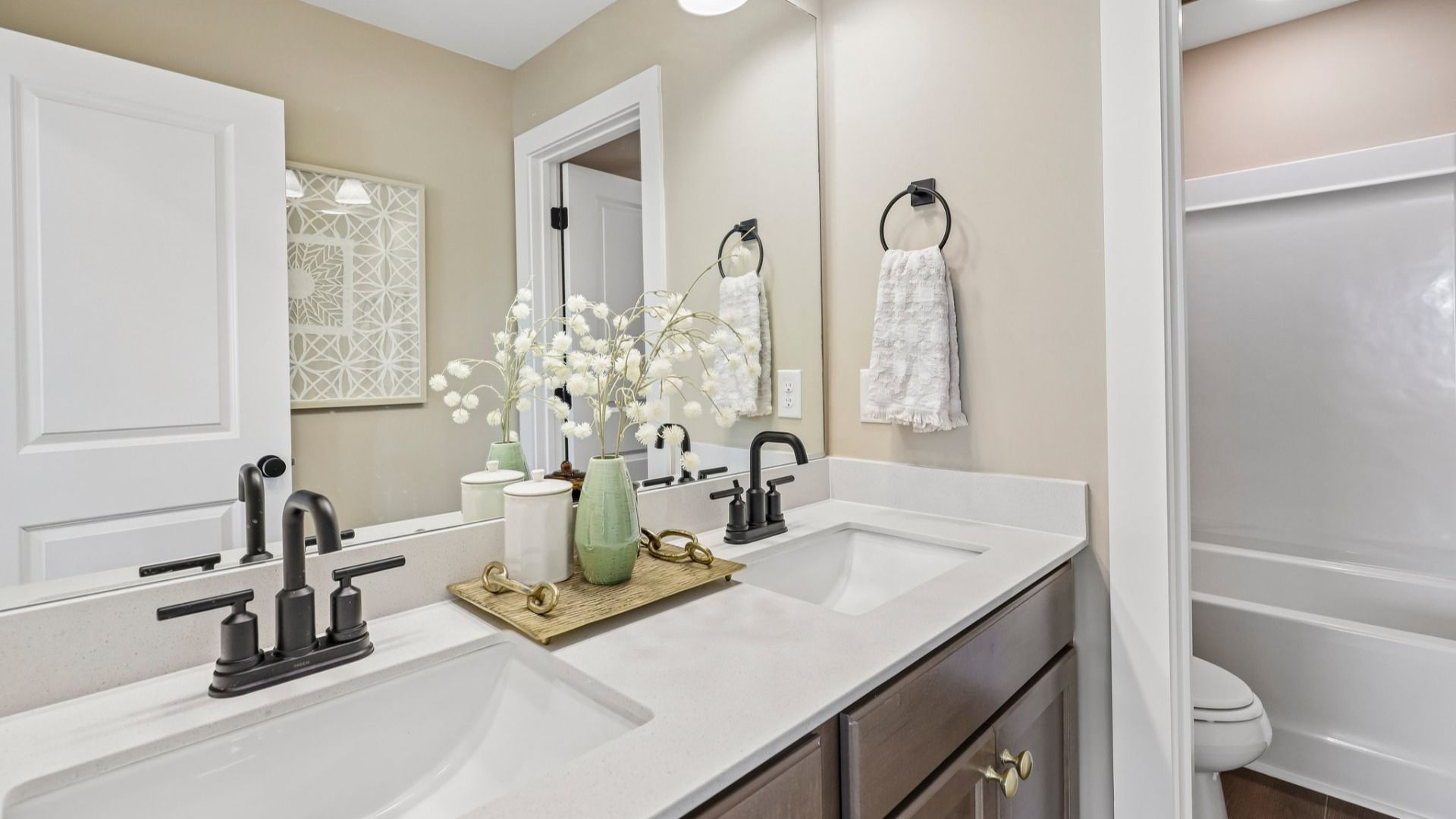 Secondary bathroom with dual vanity