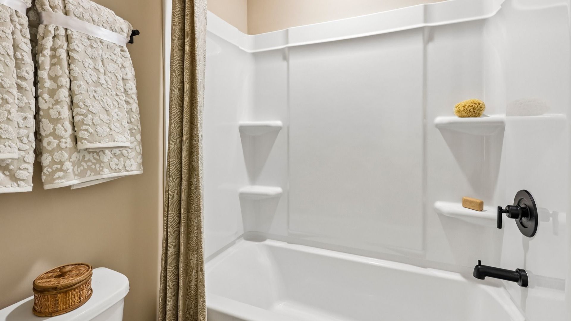Secondary bathroom with shower and toilet