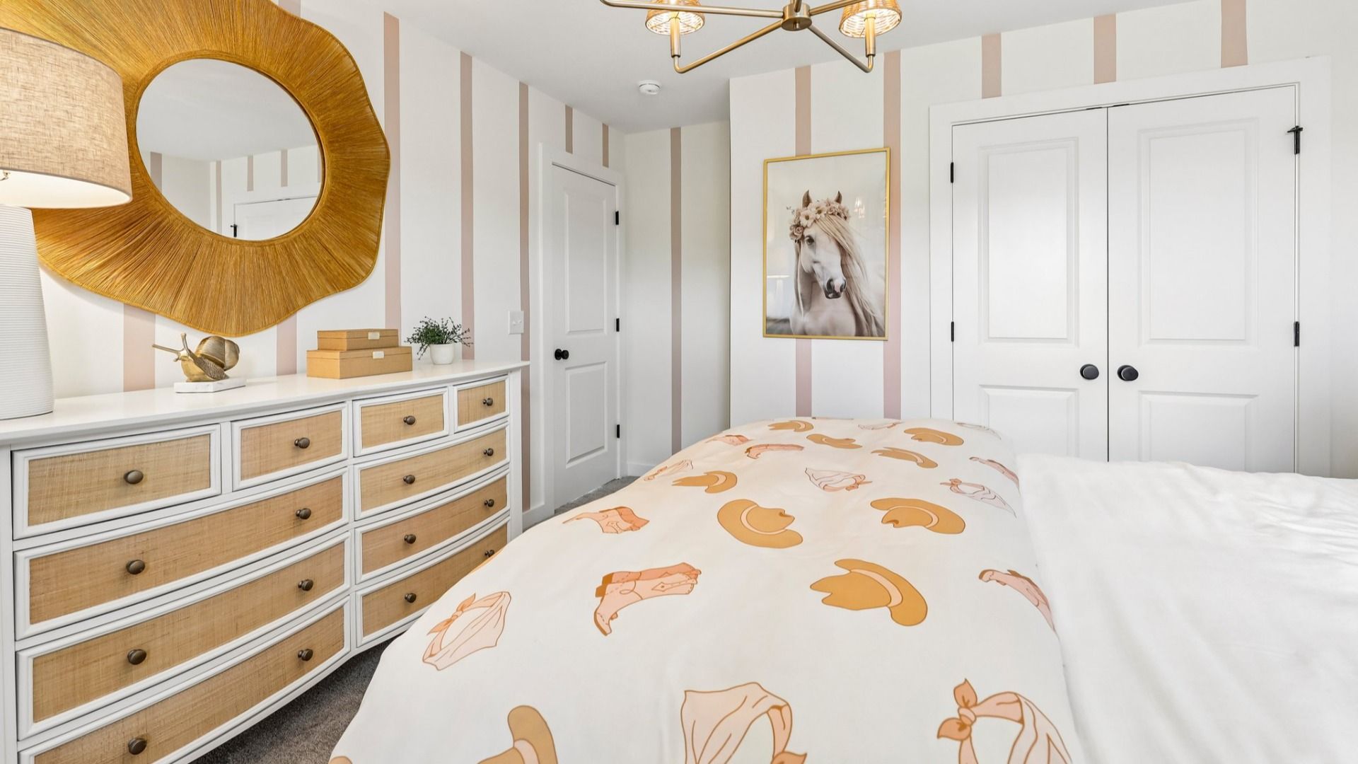 Secondary bedroom with carpet, closet, and window