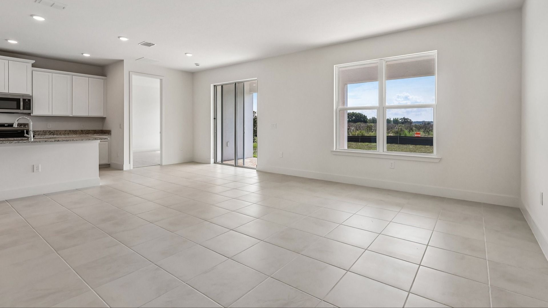 Acacia Floor Plan Living Area & Dining Area in New Home Community Lakeside at Satilla in St. Cloud, FL