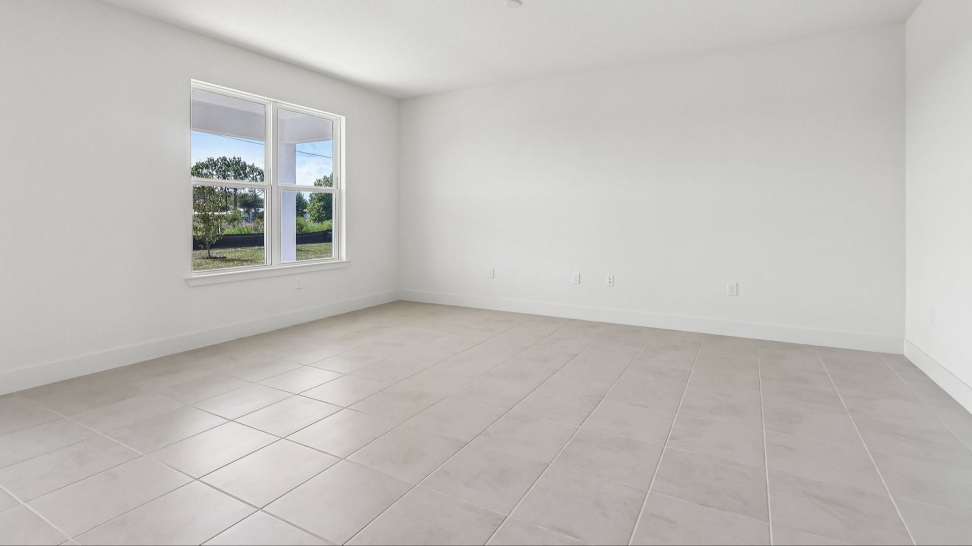 Acacia Floor Plan Living Area & Dining Area in New Home Community Lakeside at Satilla in St. Cloud, FL