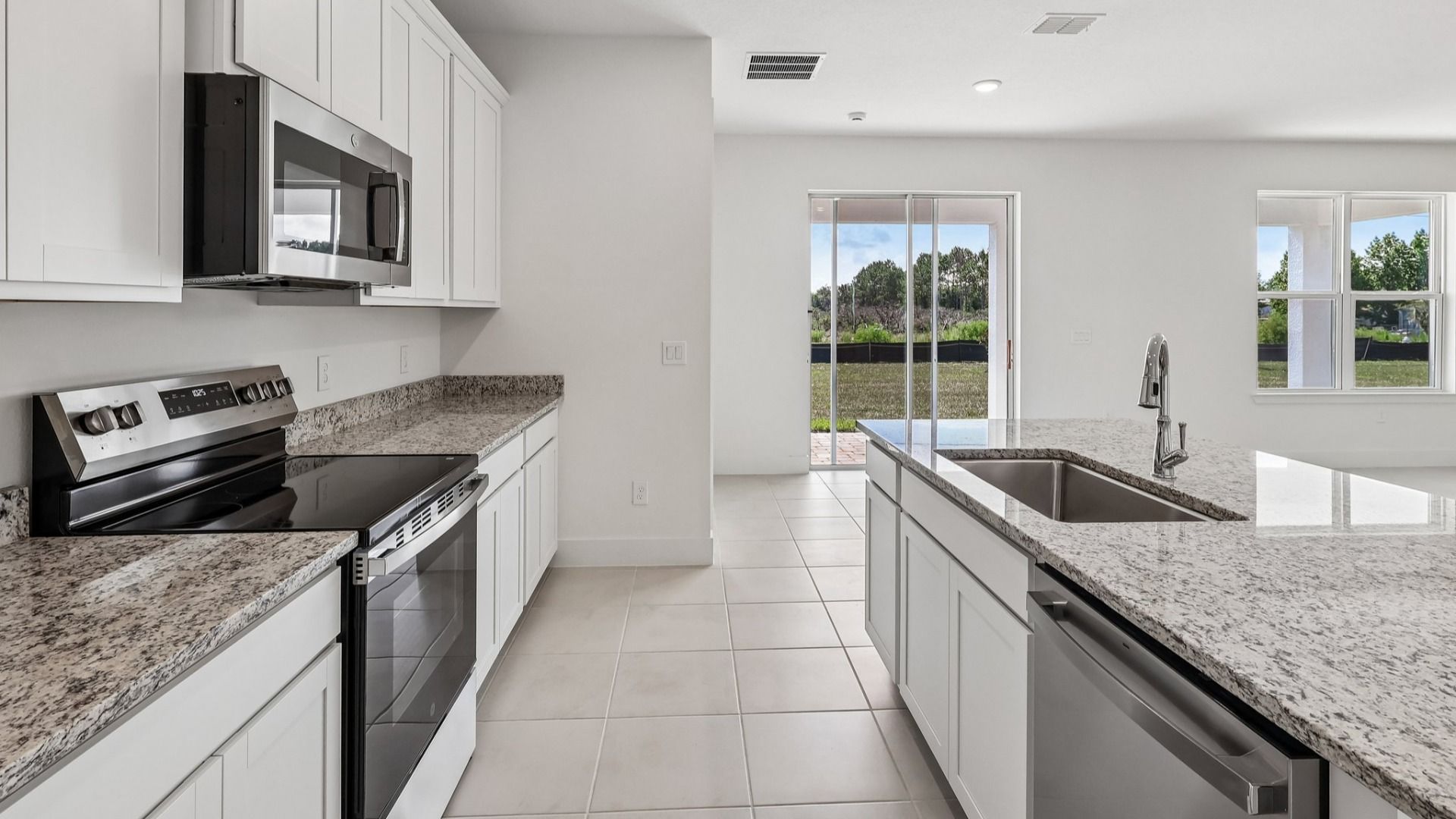 Acacia Floor Plan Kitchen in New Home Community Lakeside at Satilla in St. Cloud, FL