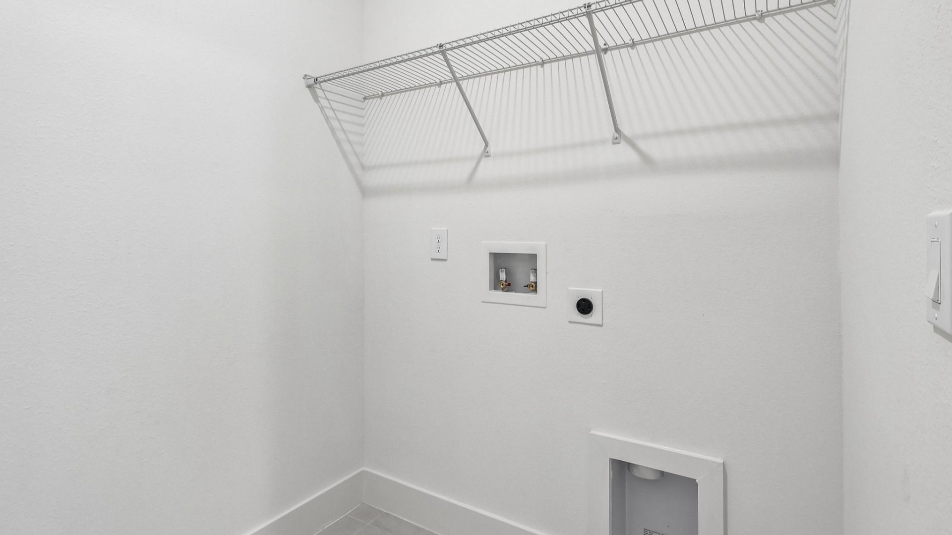 Acacia Floor Plan Laundry Room in New Home Community Lakeside at Satilla in St. Cloud, FL