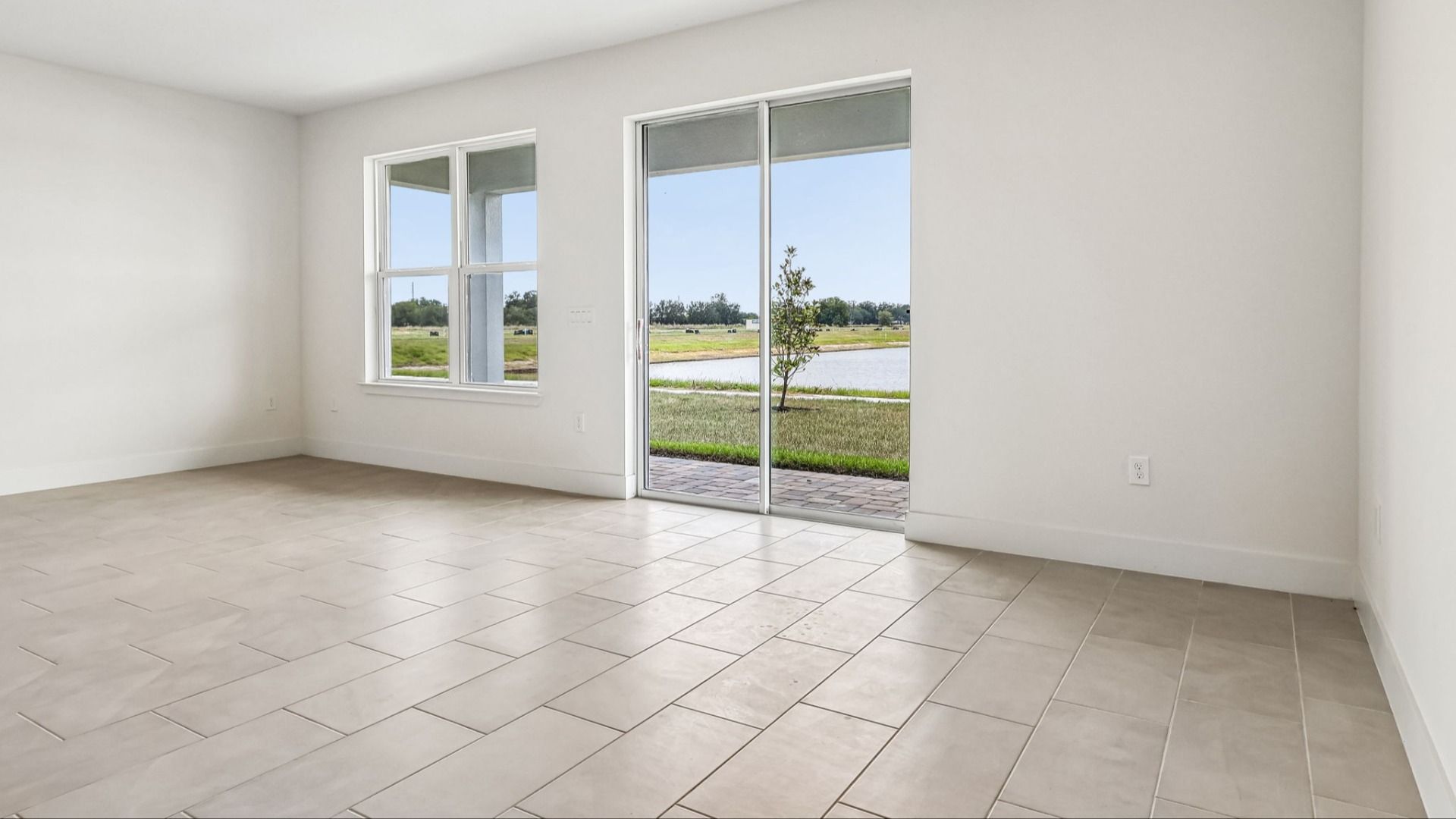 Longleaf Floor Plan Living Area and Lake Views DRB Homes Lakeside at Satilla in New Homes St. Cloud