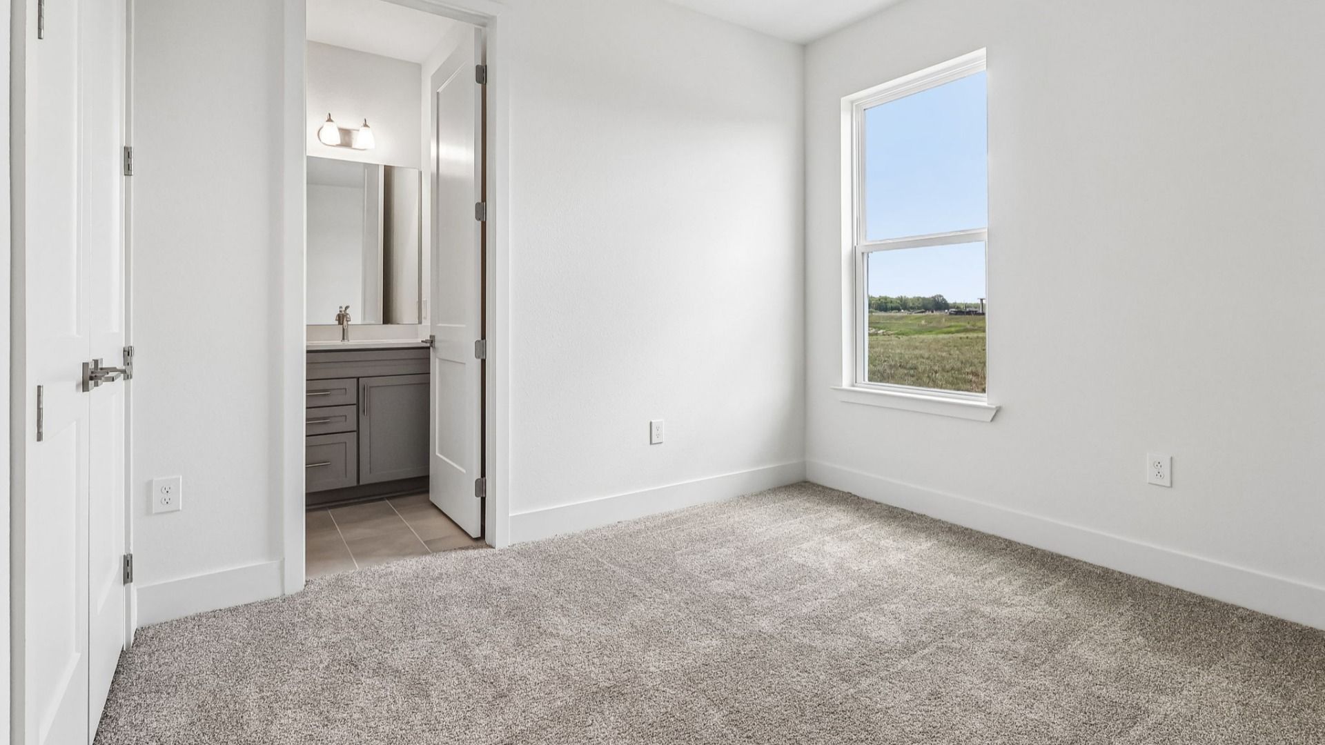 Longleaf Floor Plan Secondary Bedroom with en suite Bath by DRB Homes Lakeside at Satilla in New Homes St. Cloud