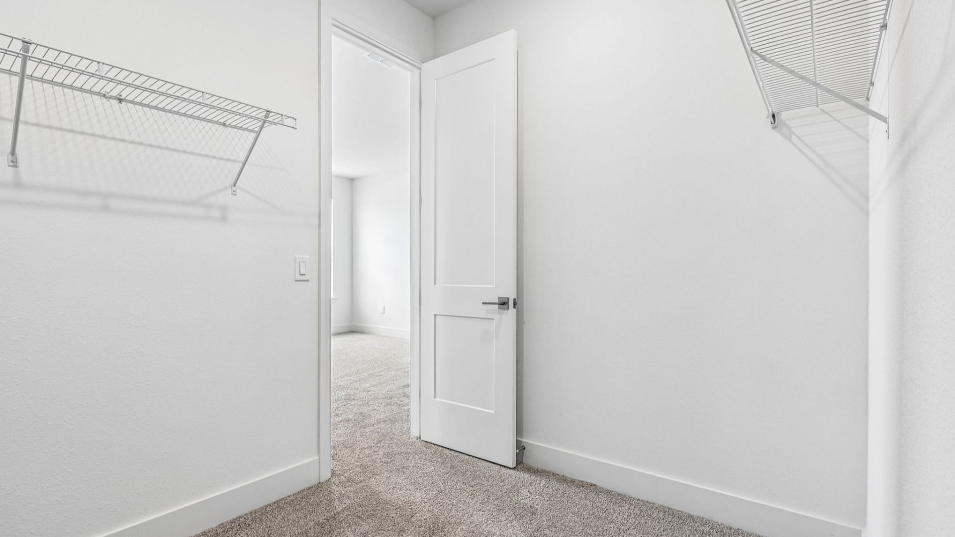 Longleaf Floor Plan Primary Suite Walk-in Closet by DRB Homes Lakeside at Satilla in New Homes St. Cloud