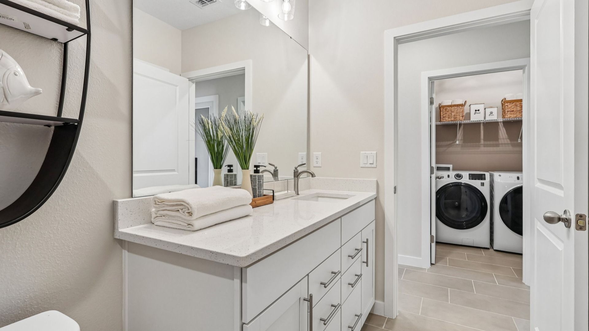 Flagler Floor Plan Shared Bath well appointed across from the bathroom and off of the garage.