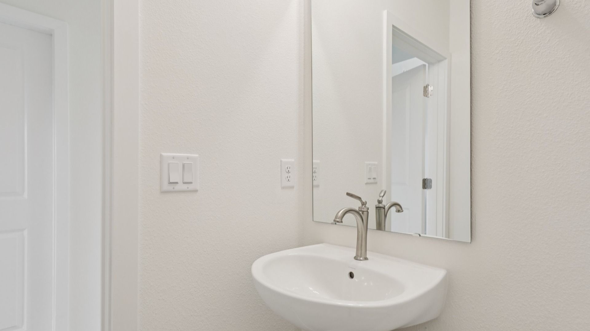 Half Bath in the Naples Floor Plan by DRB Homes