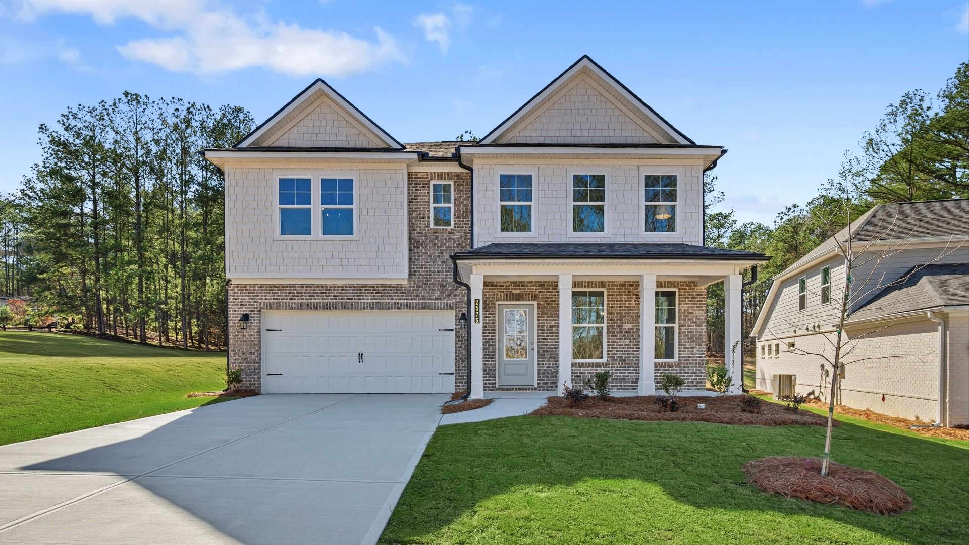 Front exterior of Brier Creek floorplan with 2-car garage