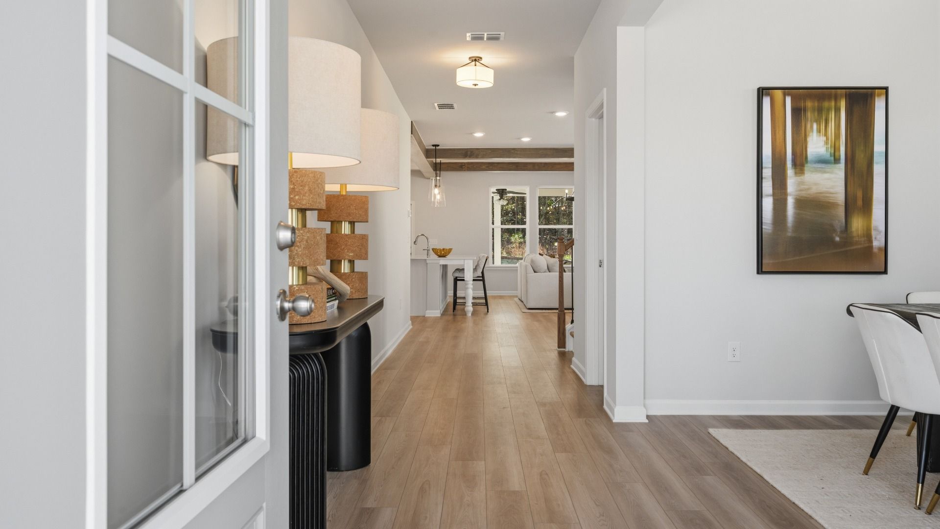 Front entryway with access to dining area and view of main living areas