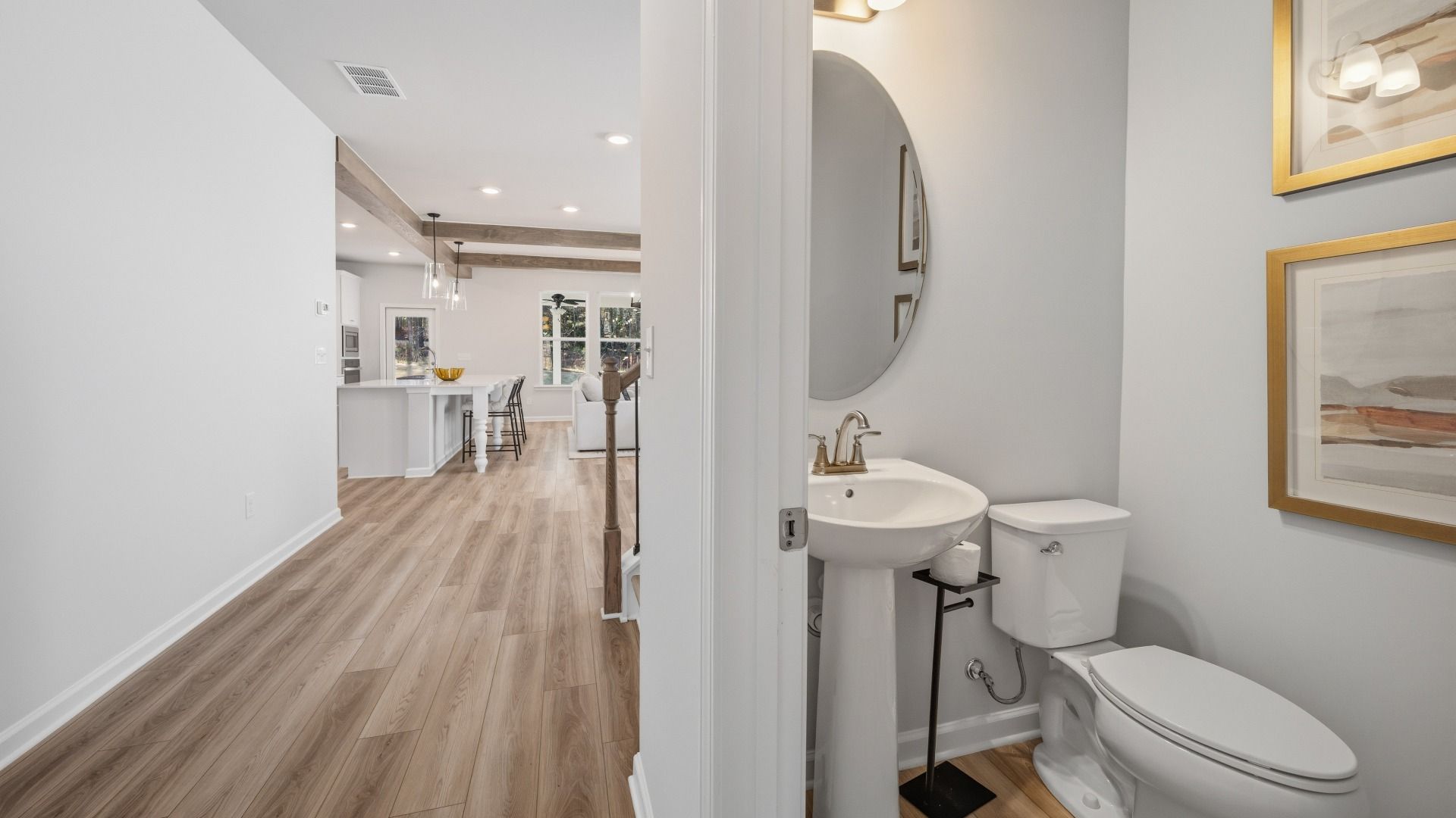 Dedicated powder room with access to first floor main living areas