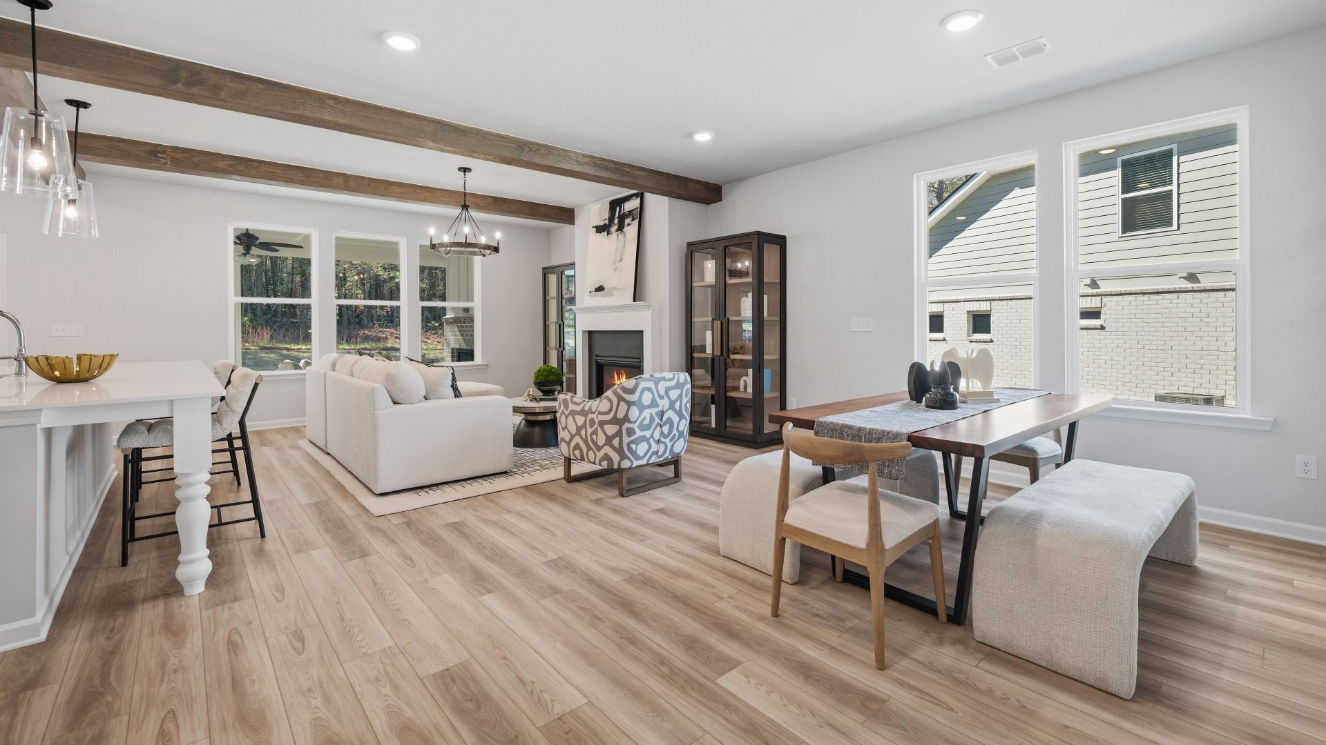 First floor with view of dining area, kitchen, and gathering room