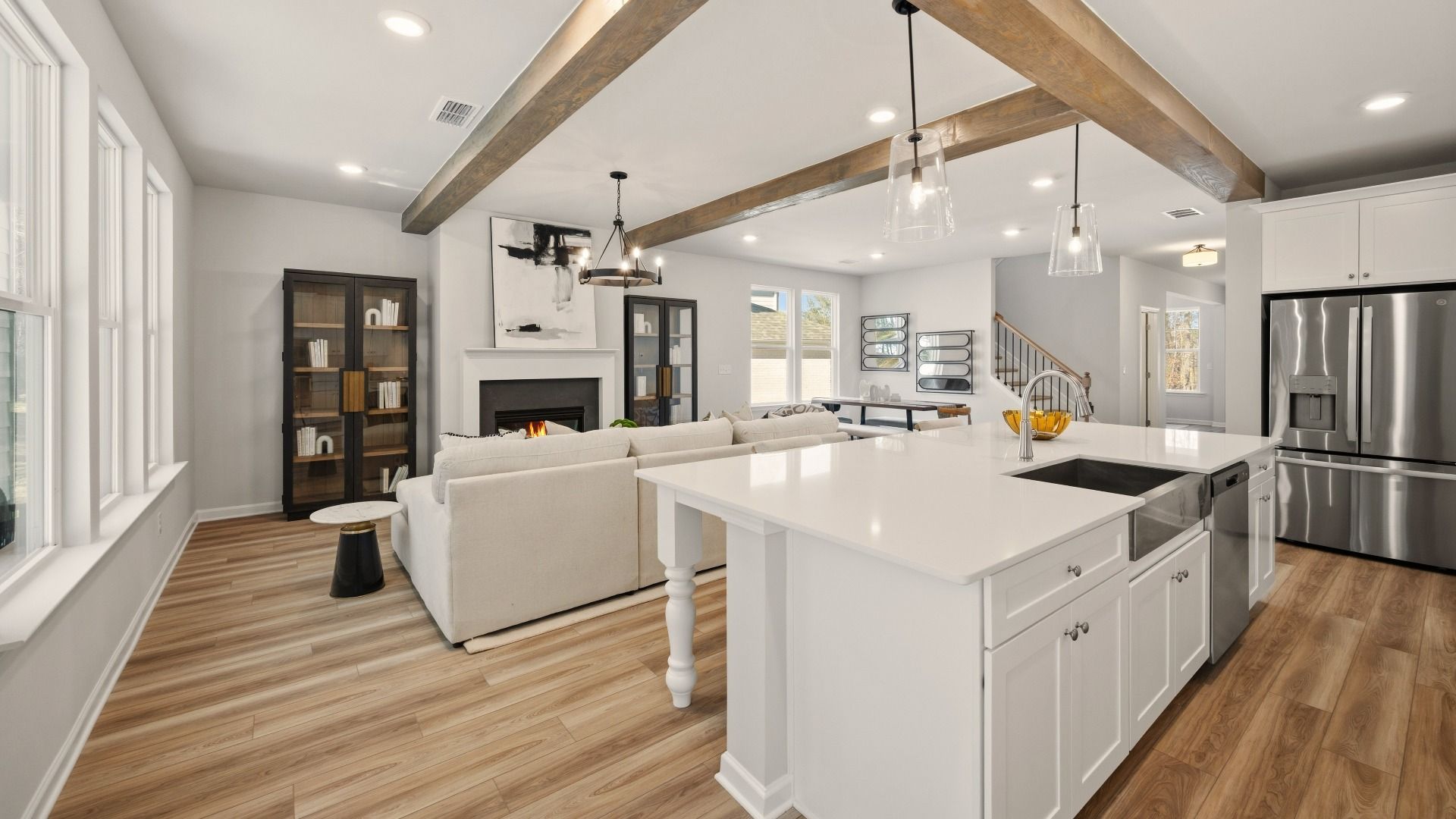 Kitchen with view of gathering room and dining area