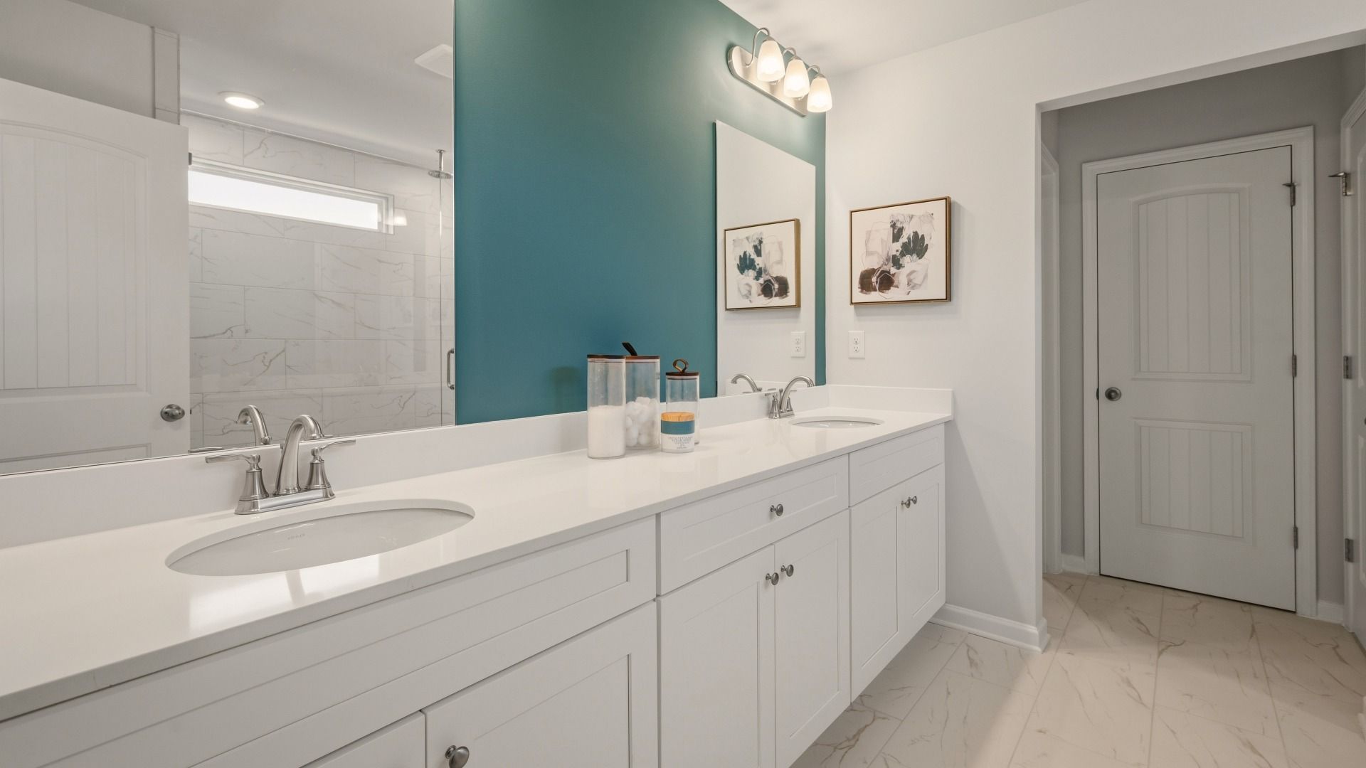 Primary bathroom with dual vanity