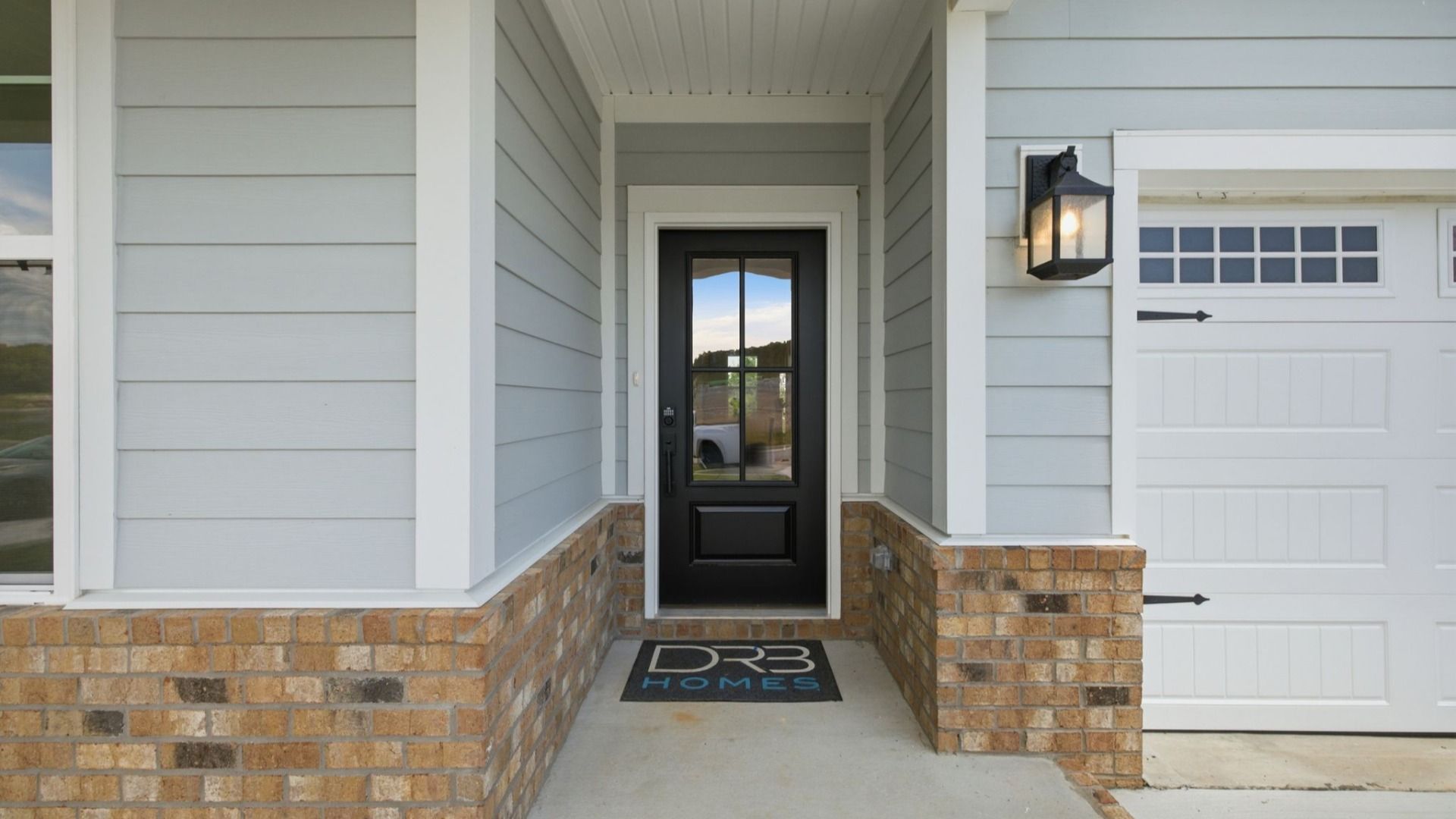 Front Entryway from exterior of home with black door
