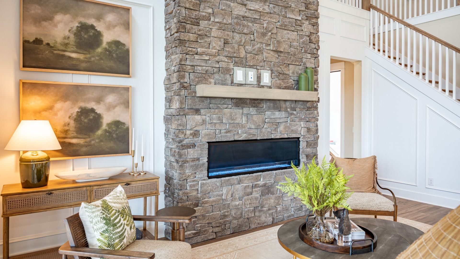Gathering room with fireplace and access to rear porch