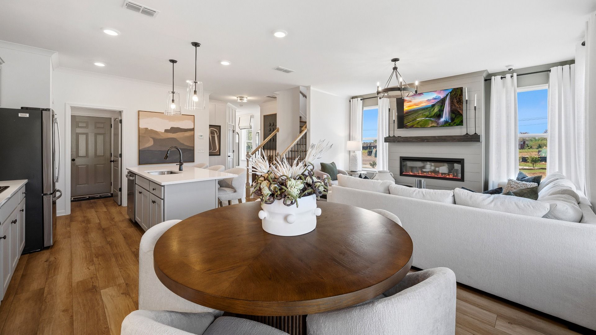 Large open concept layout with spacious living room and upscale kitchen