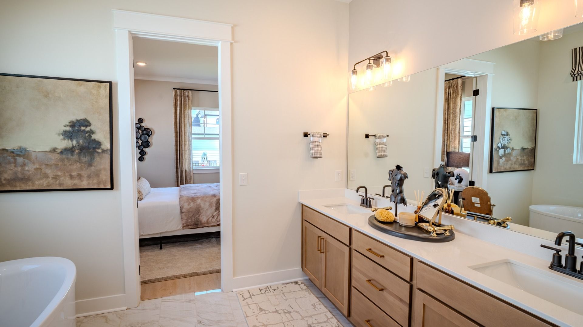 Primary bathroom with dual vanity and soaking tub