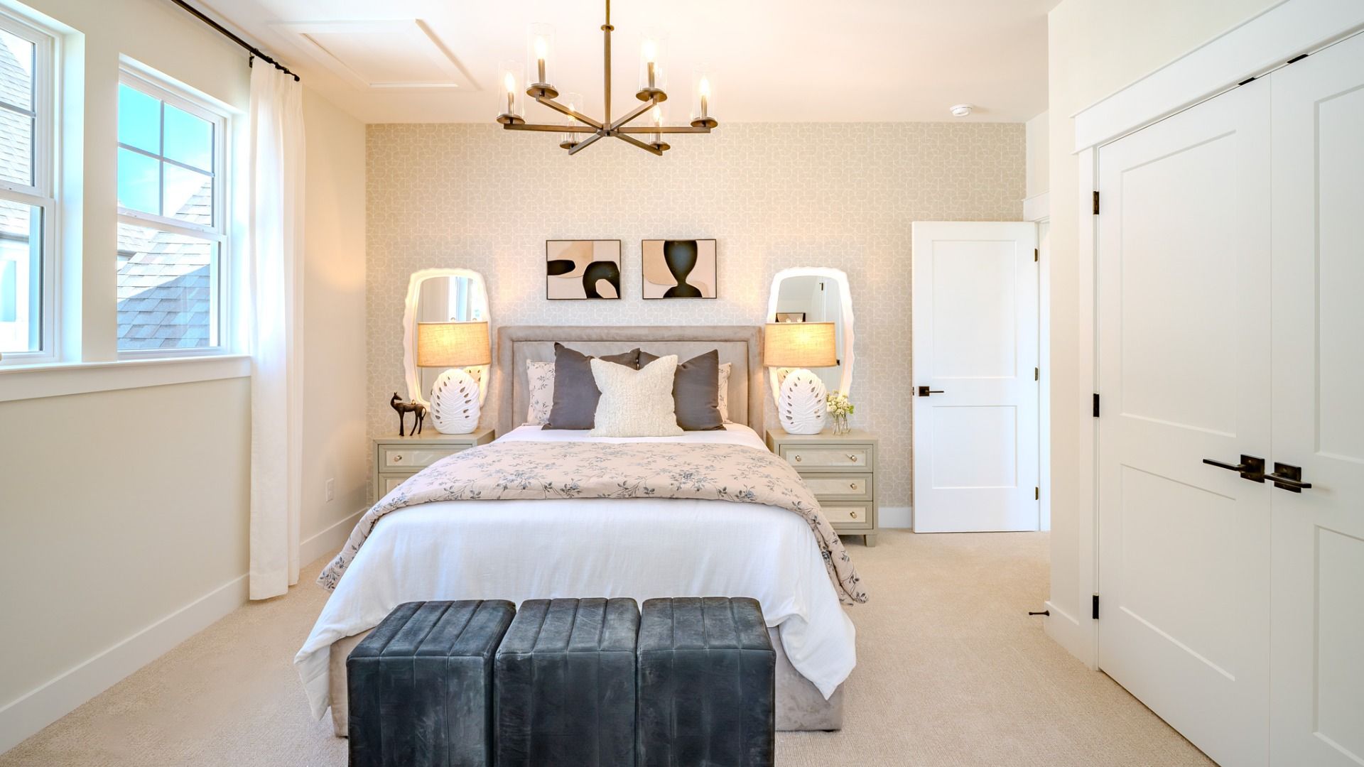 Secondary bedroom with carpet and bright natural light from windows