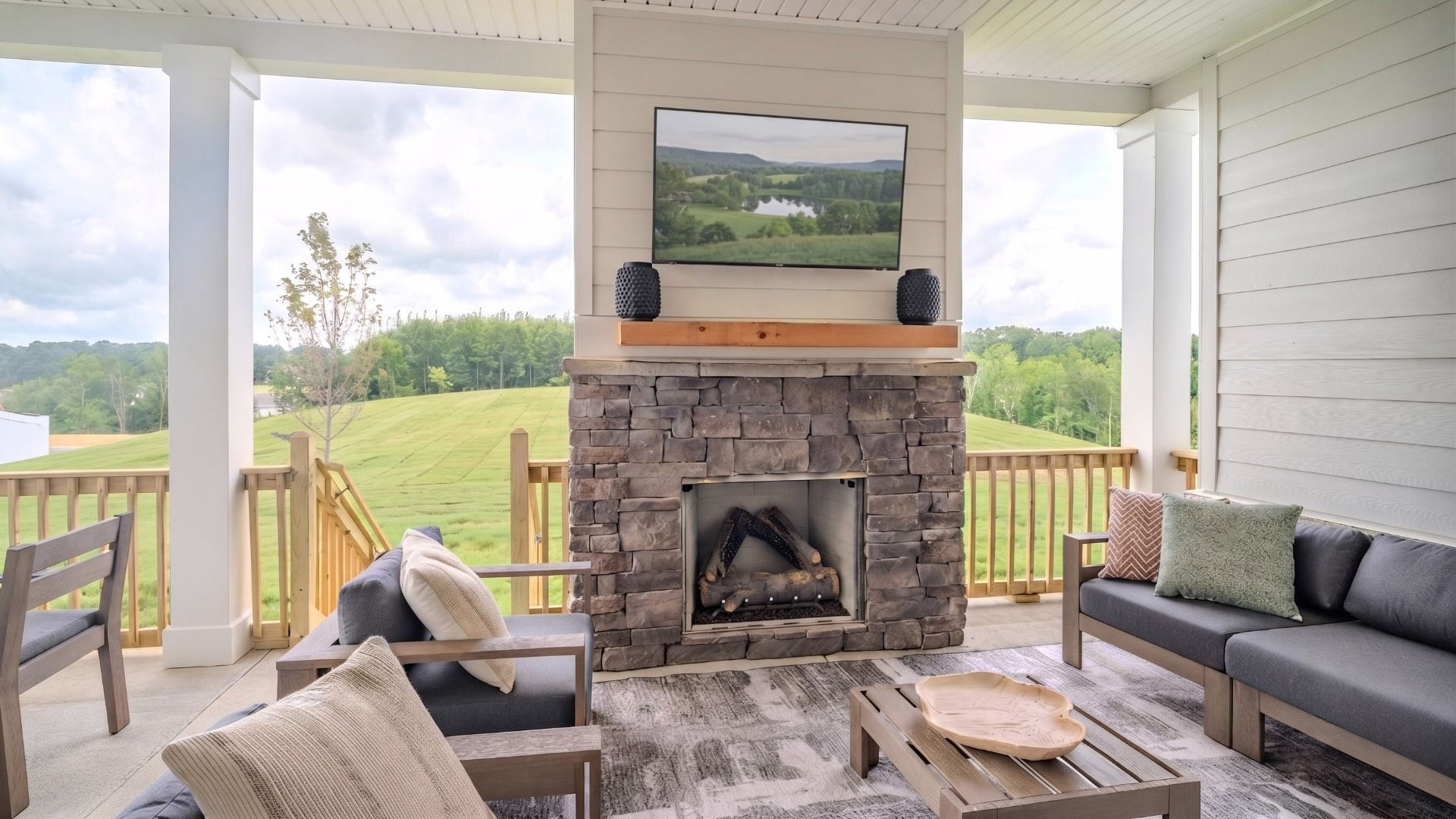 Spacious rear covered patio with fireplace