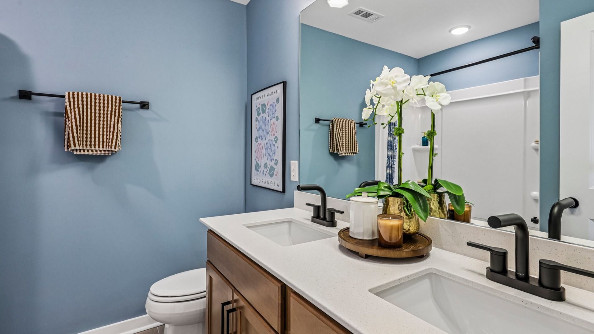 Secondary bathroom with dual vanity