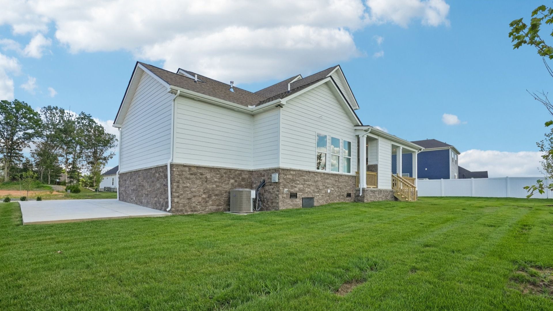 Rear exterior with view of large, covered porch
