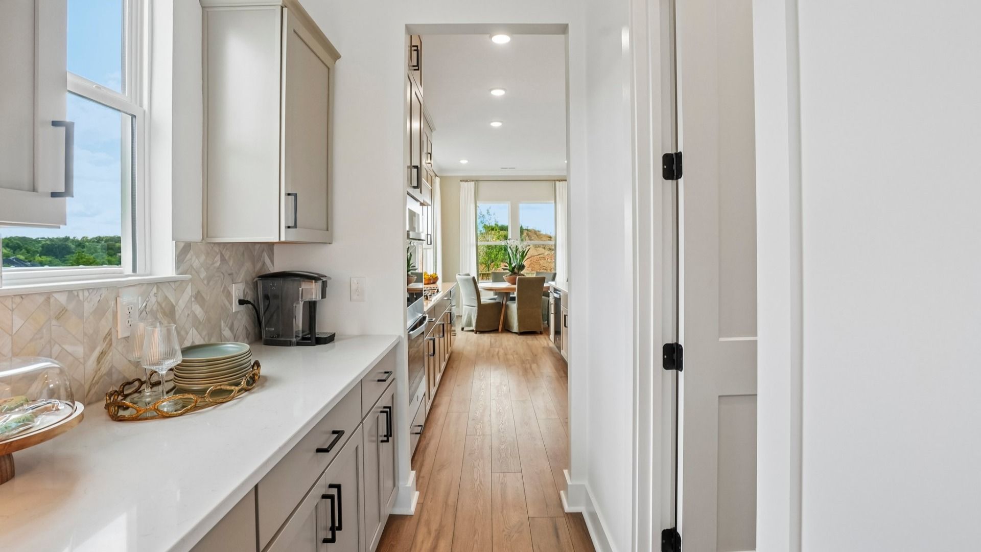 Separate area of kitchen with access to pantry