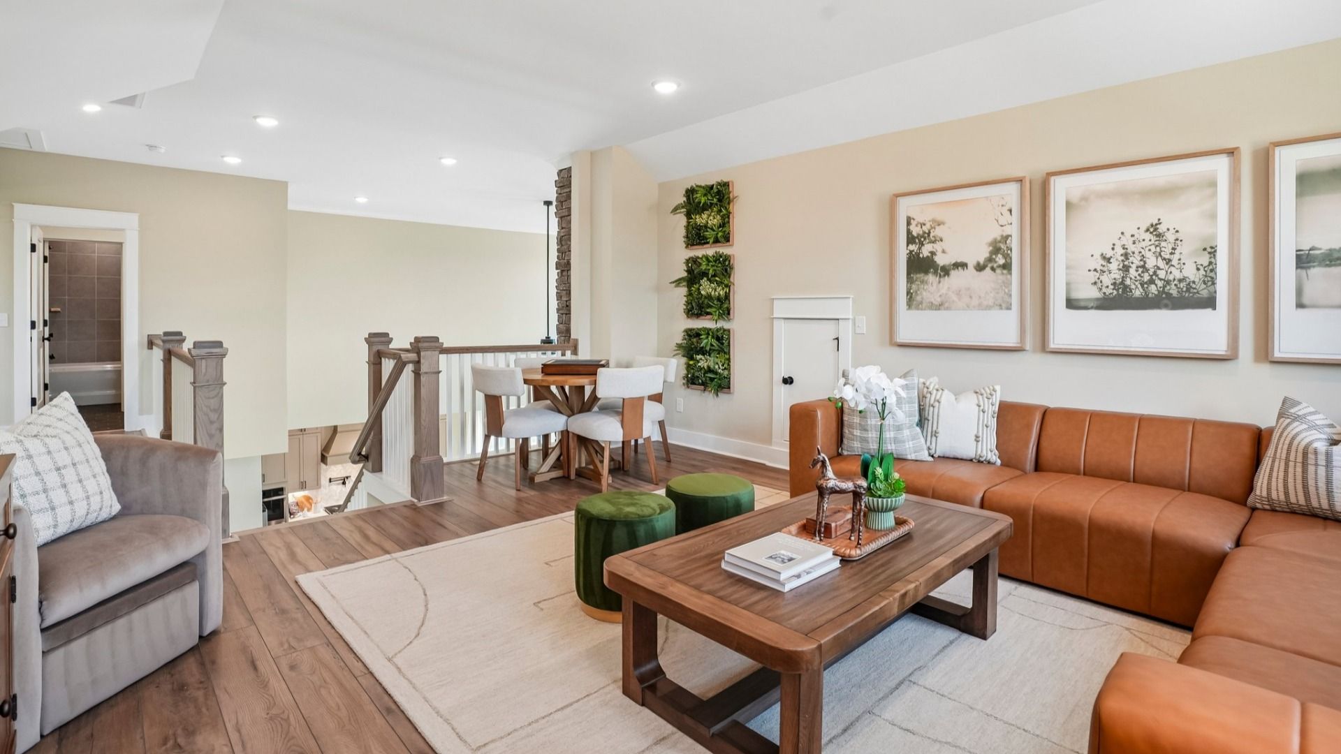 Spacious loft area with access to staircase and walkway to bedrooms