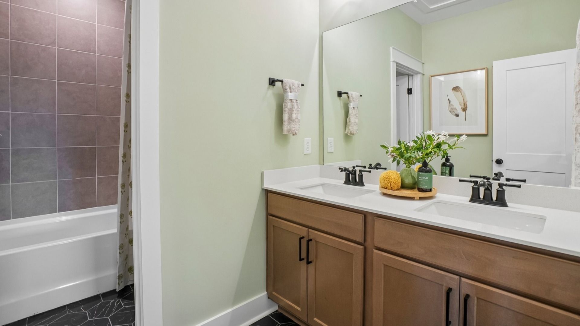 Secondary bathroom with dual vanity