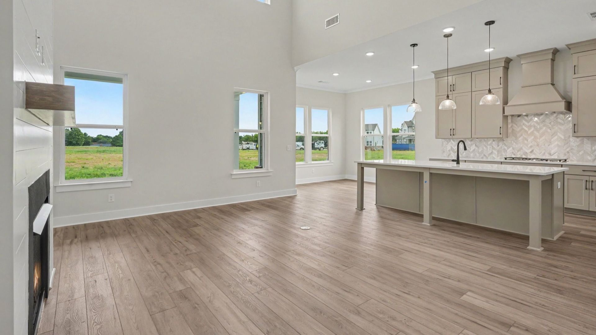 Gathering room with view of kitchen and cafe area