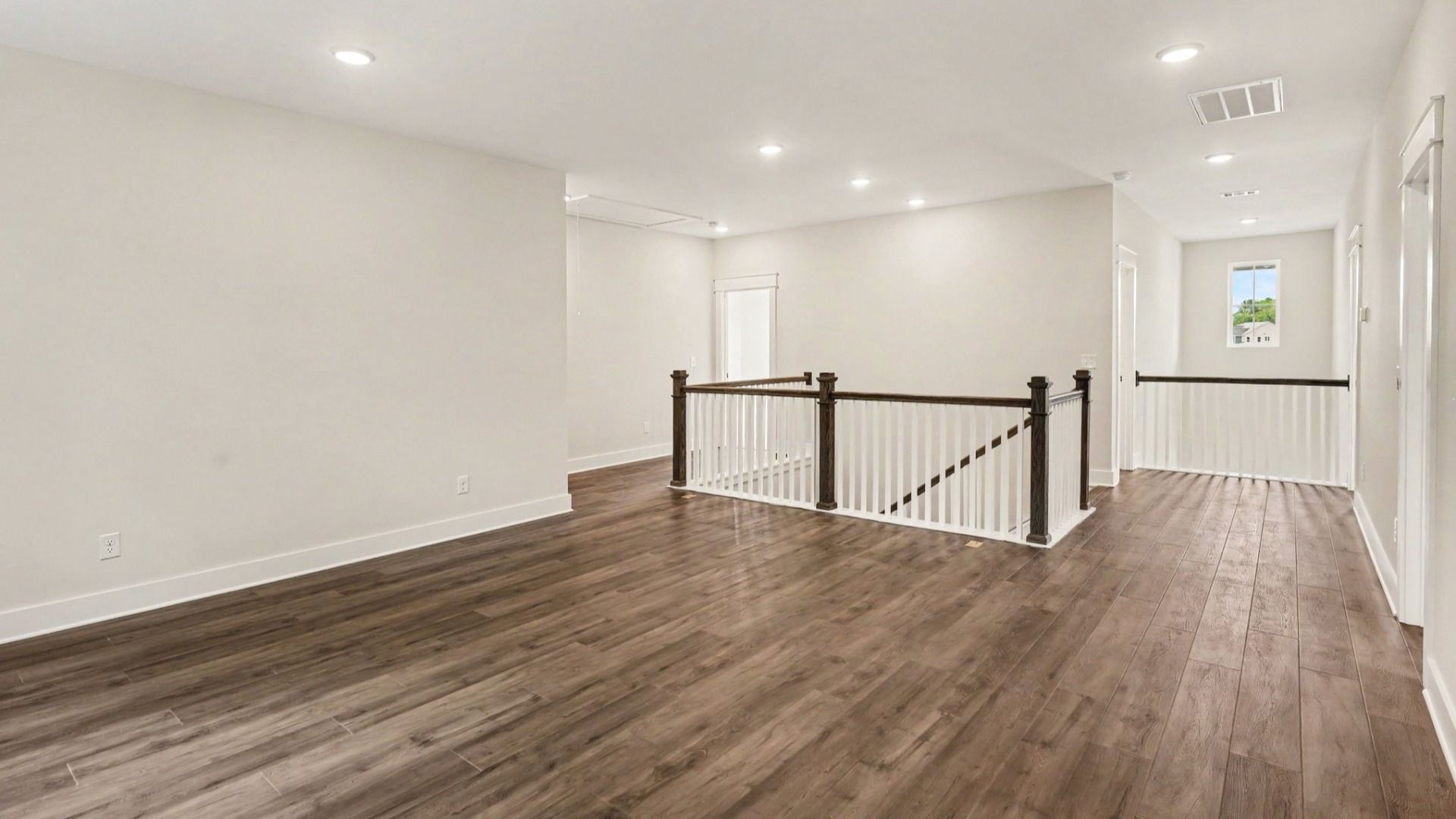 Spacious loft area with access to bedrooms