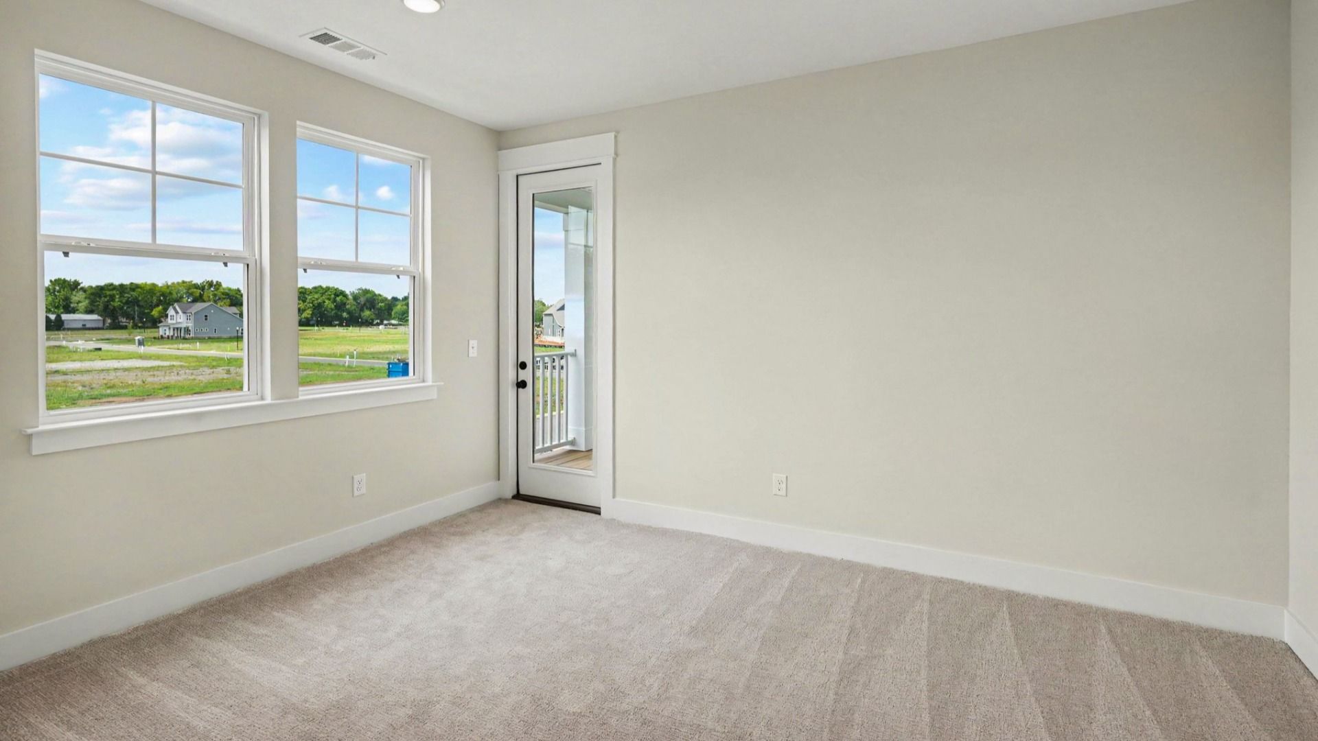 Primary suite flex space with windows