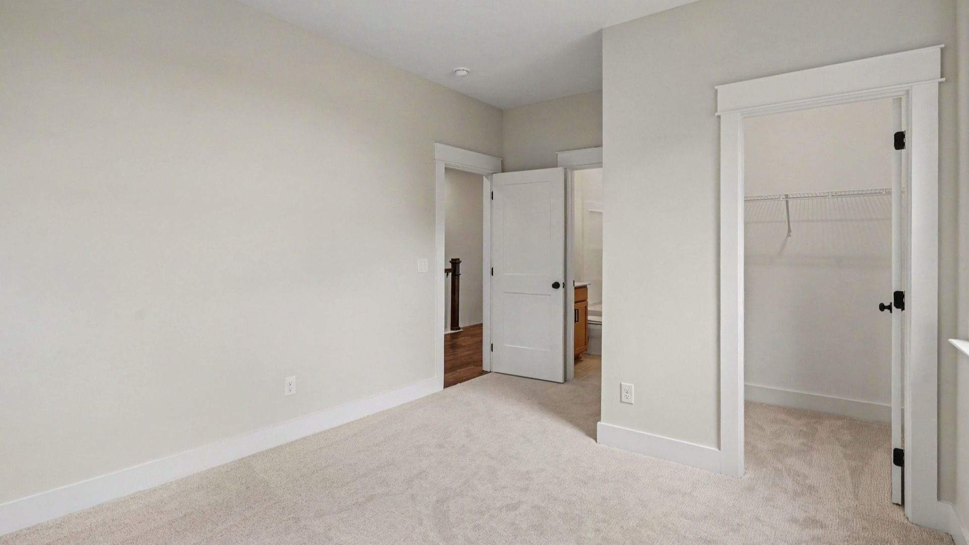 Bedroom with carpet and closet