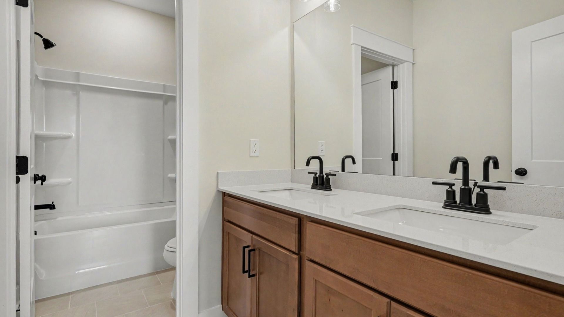 Secondary bathroom with dual vanity