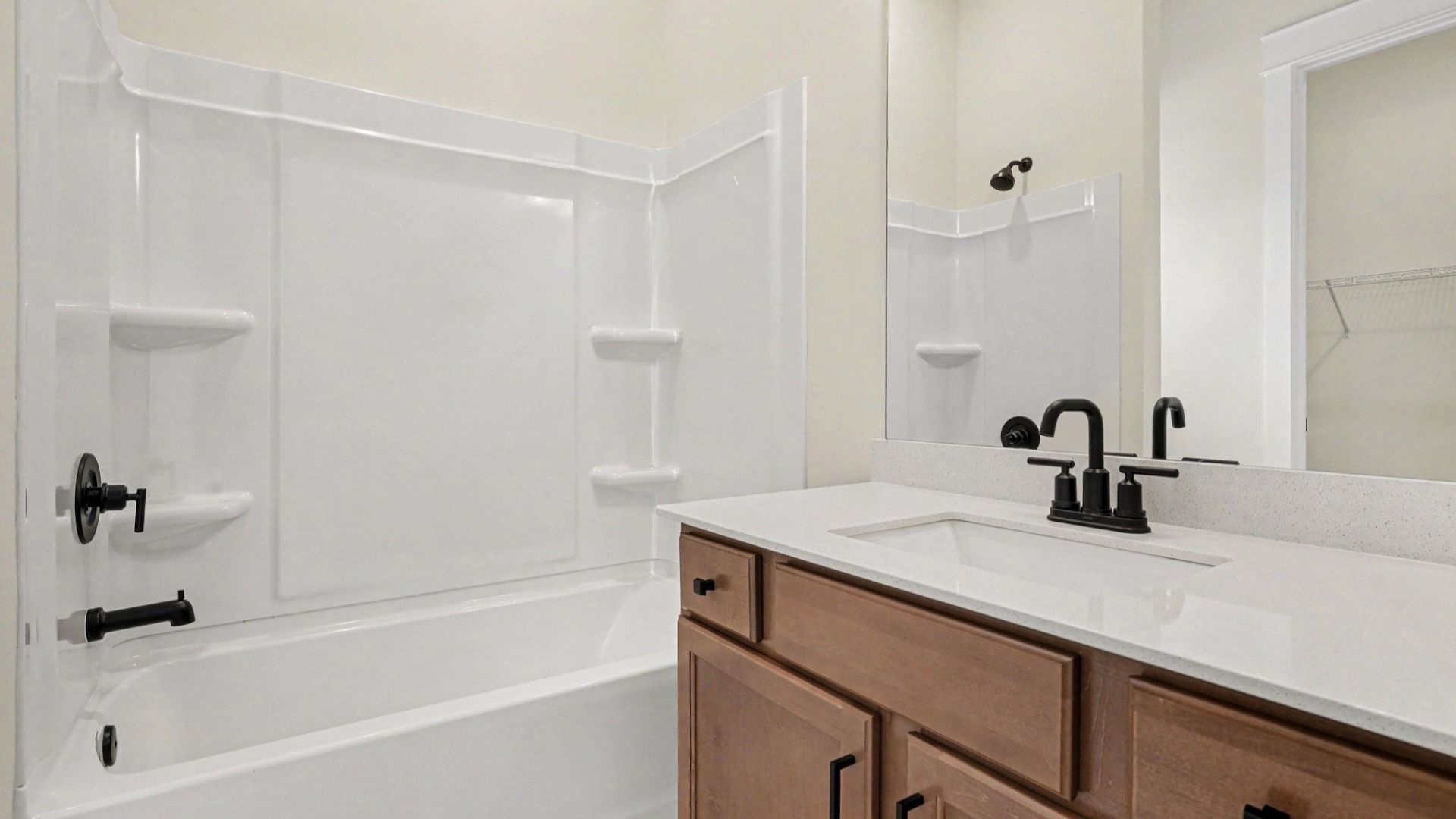 Secondary bathroom with single vanity