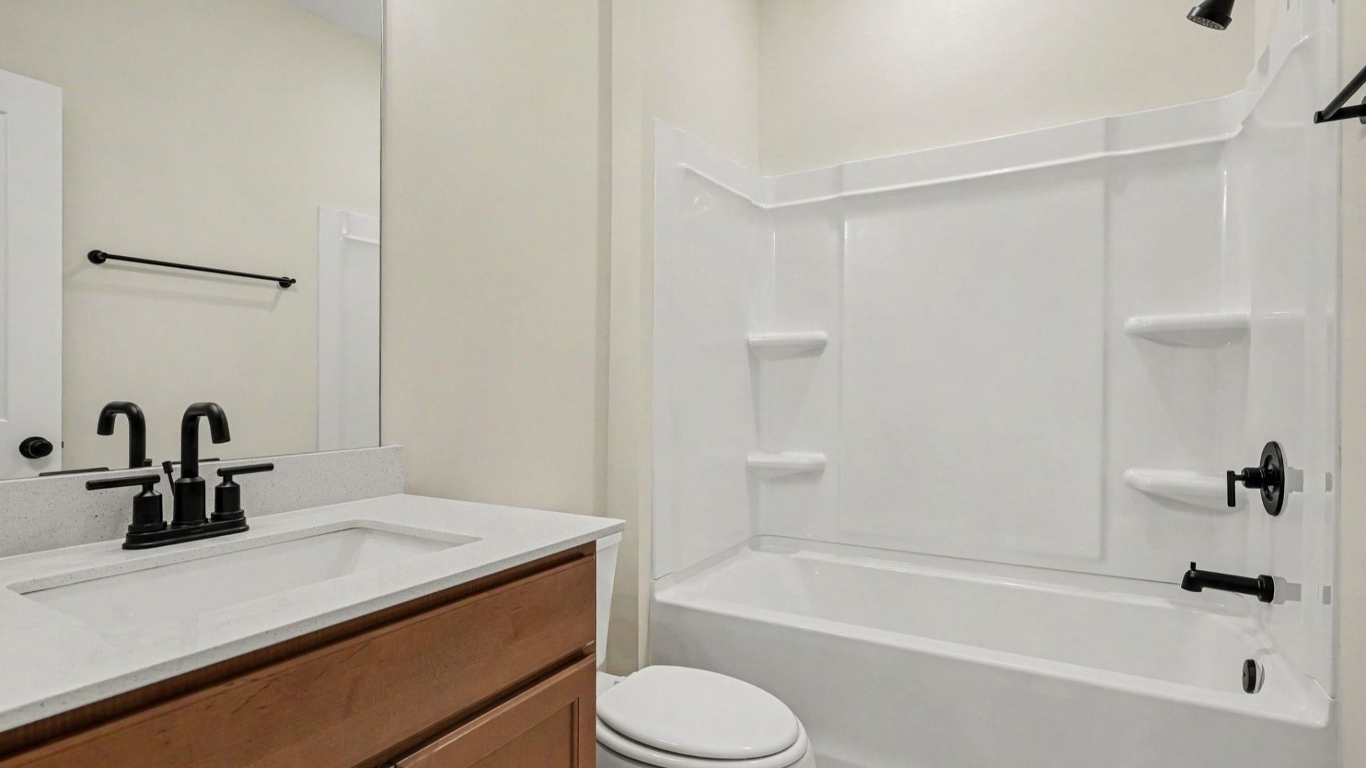 Secondary bathroom with single vanity