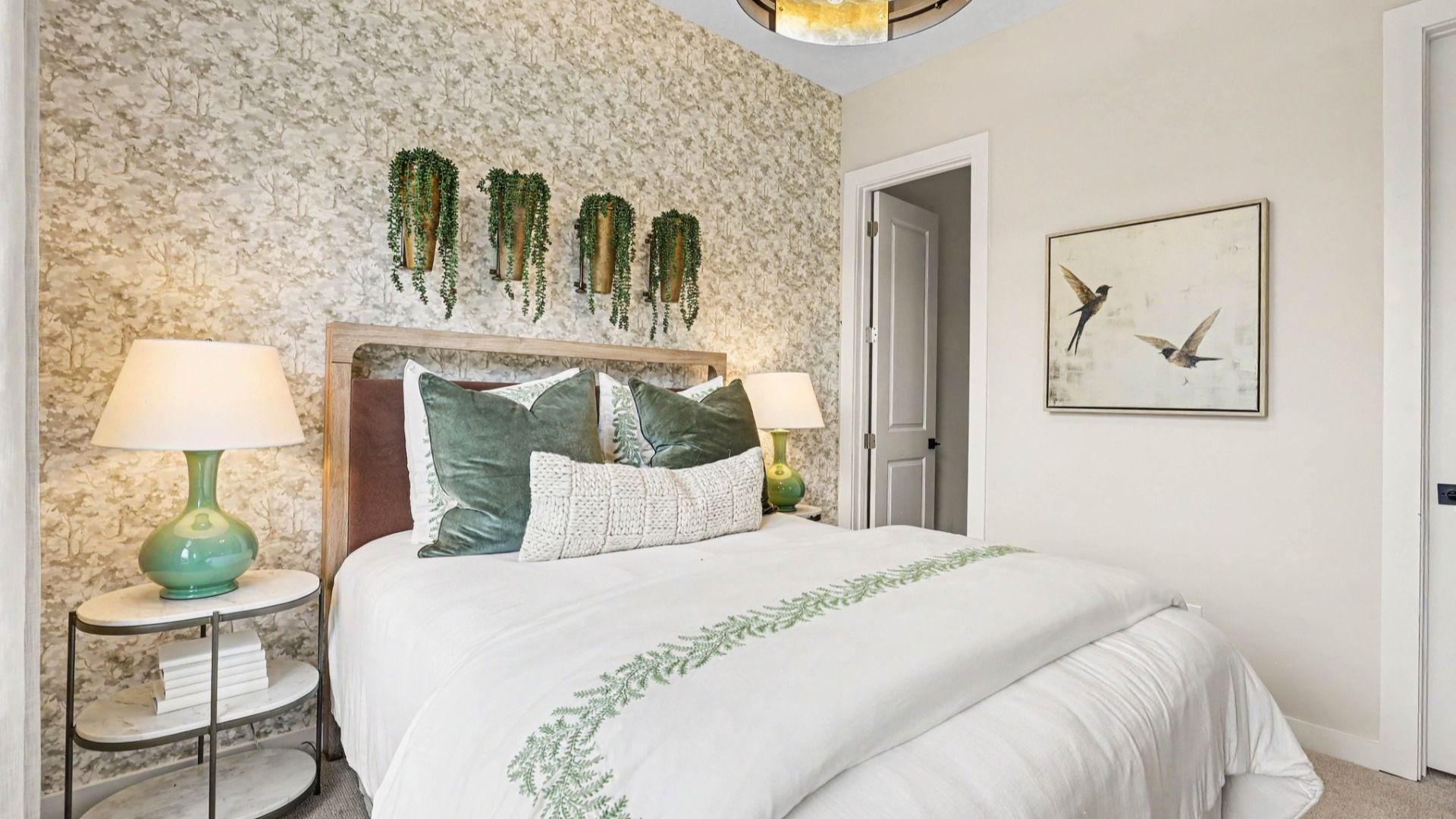 Secondary bedroom with carpet and closet