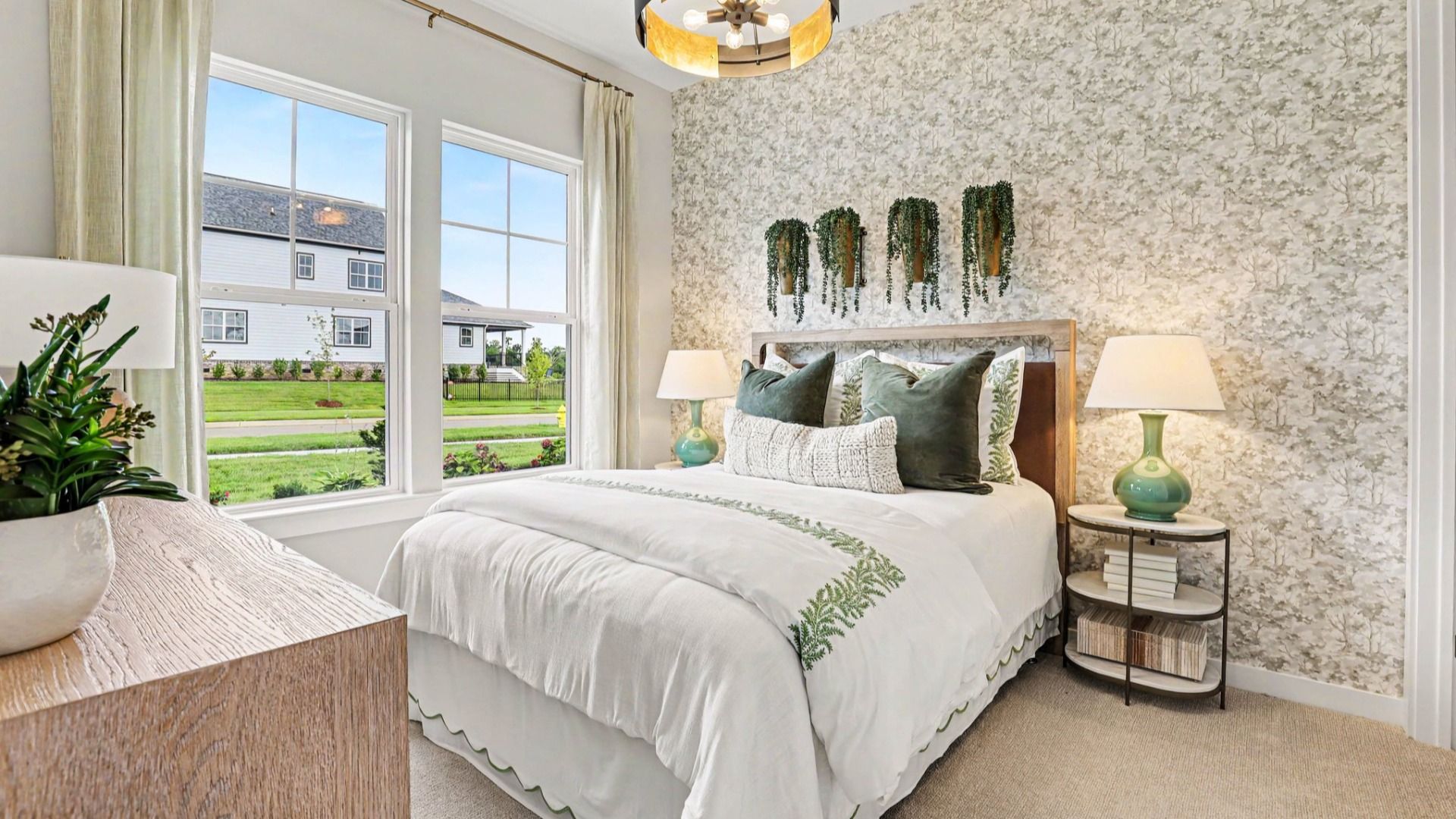 Secondary Bedroom with carpet and windows
