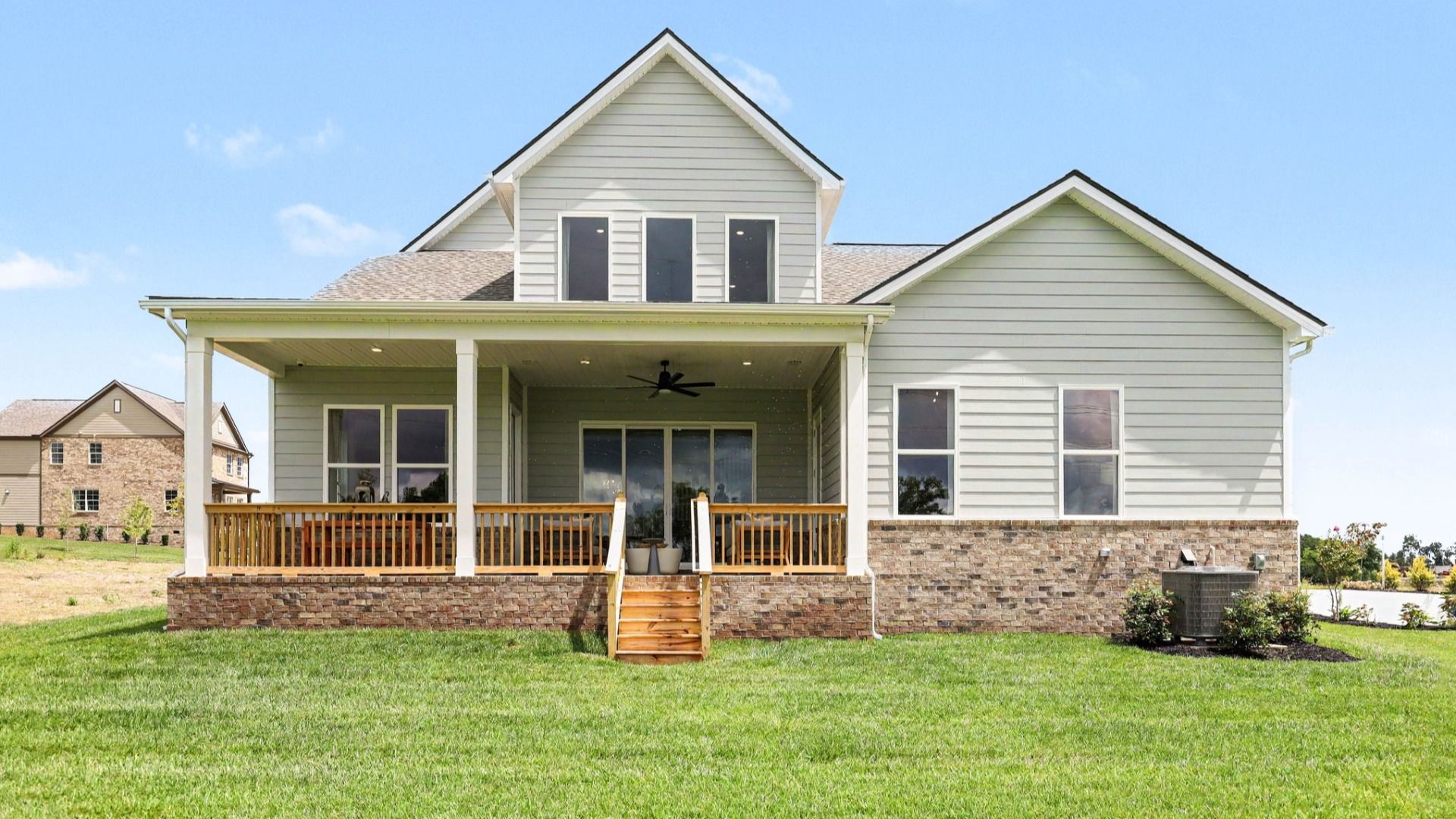 Rear exterior with view of rear covered patio