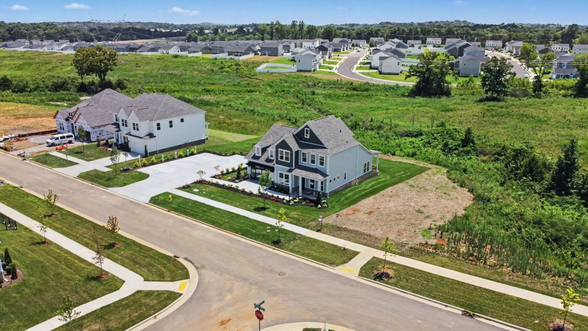 Community photo with model home