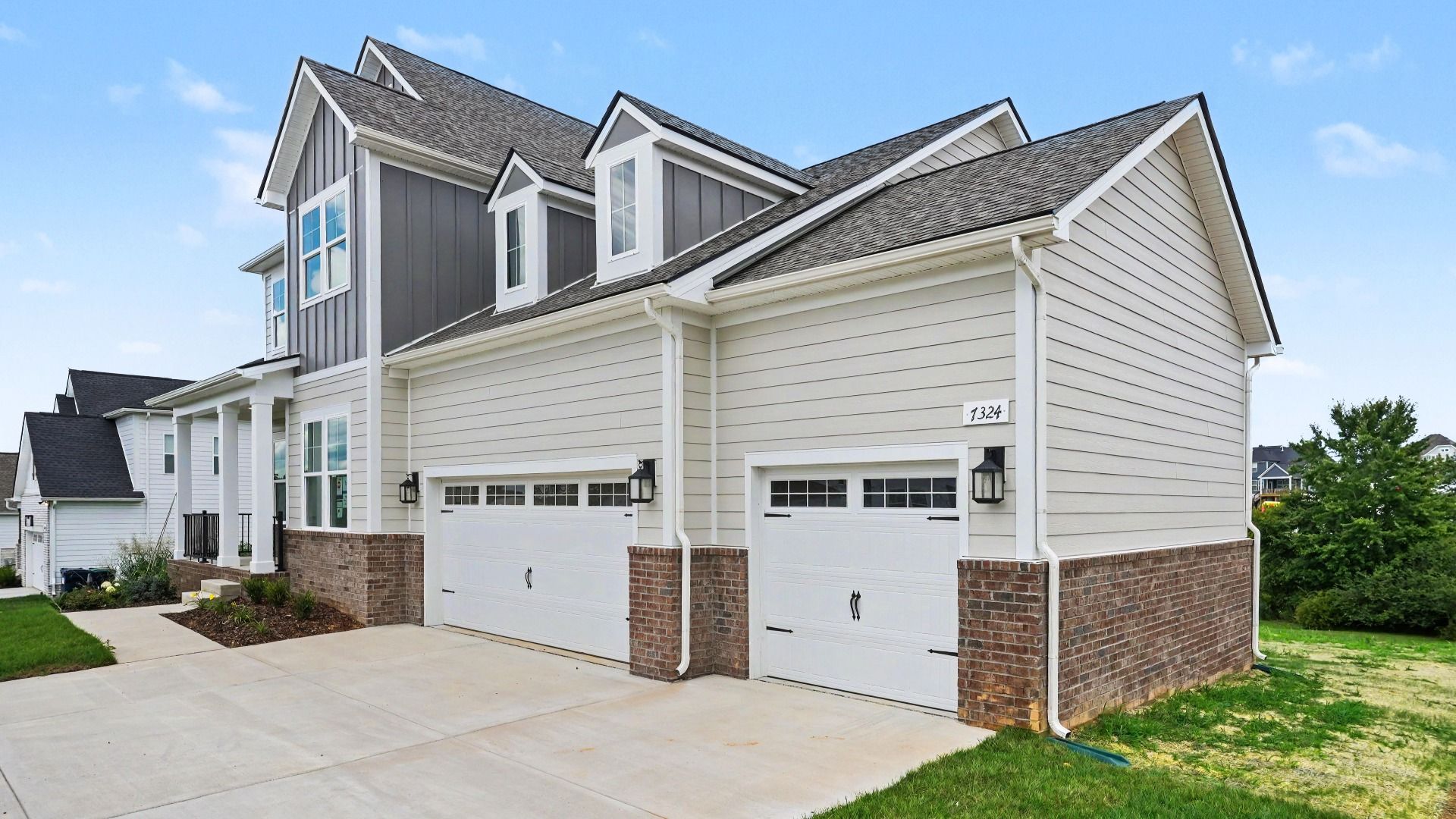 Front exterior with 3-car garage